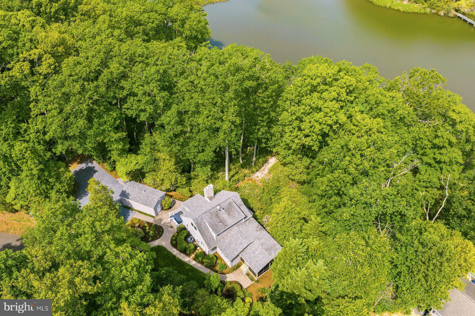 Meticulously maintained and thoughtfully updated, this stunning waterfront home in Mechanicsville, Maryland offers a rare opportunity to own 2.09 acres with approximately 381 feet of shoreline. Featuring sweeping, panoramic water views create a beautiful backdrop from nearly every angle to be enjoyed from inside the home, the spacious screened porch, or the pier. The tax record square footage is incorrect; the home offers approximately 1,788 finished square feet, featuring 3 bedrooms and 2 full bathrooms. Rebuilt in 2004 that included new addition featuring new electrical wiring, windows, drywall, oak flooring, lighting, kitchen cabinetry, sound system, and vinyl siding, a new well and a tranquil 14’ x 18’ screen porch. Thoughtfully designed to embrace the waterfront lifestyle, this property provides direct access for boating, kayaking, crabbing and fishing, while also offering the perfect setting to relax and take in the peaceful surroundings. The private pier extends your living space to the water’s edge, ideal for enjoying sunrises, sunsets, and everything in between. Inside, a bright open floor plan with a backdrop of windows and welcomes you with a lovely family room anchored by a gas fireplace, seamlessly connected to the kitchen featuring granite countertops and extensive cabinetry and newer appliances. A main-level bedroom, full bathroom, and laundry room add flexibility and convenience. Upstairs, two additional bedrooms and an updated full bathroom provide gorgeous, comfortable accommodations.  Additional extensive updates and improvements over the years include a new 8' x 10' storage shed (2025), new kitchen stove (12/2025), detached single-car garage with a new oversized garage door (2025), new HVAC system featuring a heat pump and propane furnace (2023), new interior paint (2022), crawl space dehumidifier installation (2021), new private pier (2020), new kitchen refrigerator (2020), new 6" gutters and 4" downspouts (2020), new front deck measuring approximately 10' x 8'6", new foyer and kitchen flooring, whole-house generator installation (2018), upper-level bathroom renovations (2017 & 2018), new roof (2017), new dishwasher (2017), new water heater (2015), new dryer (2013), gas fireplace installed by Taylor Gas (2011), crawl space encapsulation completed by JES (8/2011), and a main-level bathroom renovation (2009). This one-of-a-kind property is a rare offering combining extensive updates, acreage, and direct waterfront access, this property delivers a refined, yet relaxed lifestyle defined by space, comfort, and the natural beauty of Southern Maryland. Hurry this amazing property will not last long!