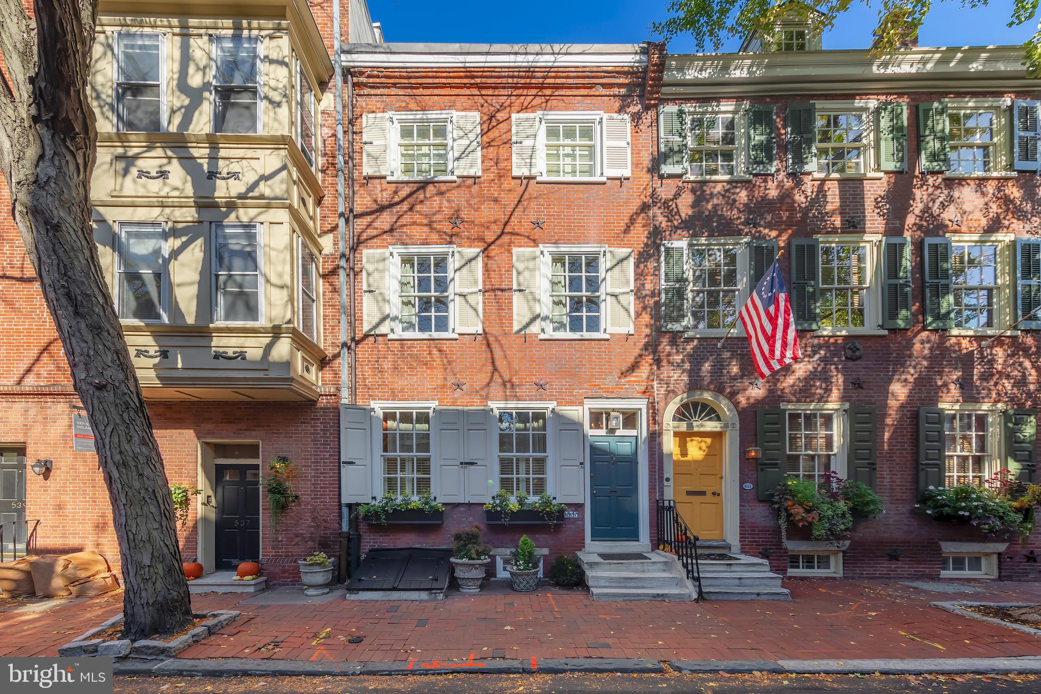 Beautiful historic home built in 1802 in the heart of Society Hill has 4 bedrooms, 3 full baths, beautiful wood floors & heated marble floors thru out the 5 levels of living space, a lovely deck great for entertaining, wainscoting on several levels and freshly painted on the outside exterior. The front windows were replaced with windows that comply with the historic registry. This lovely home is move in ready condition and has an amazing kitchen with limestone countertop island, La Cornue range, double ovens, charcoal grill plus built in La Cornue cabinets for storage.  The French doors were replaced with upgraded doors and the seller added retractable screens. The home was recently re-roofed with new shingles on the front roof, new flashing on the party wall, and re-coating of the flat roof in rear. They installed trex flooring on the rear deck. The seller has replaced the hot water heater, humidifier, refrigerator recently. All toilets were replaced with upgraded fixtures, the master bath is huge with a large shower, tub, double high vanity, heated towel rack & marble floor.  There is an annual service contract for the HVAC which is paid for through the 2024-2025 season, annual termite warranty and alarm contract all paid for through 2025. The sun shines all day long in this beautiful home because of all the natural light coming through a truly lovely home you don’t want to miss.