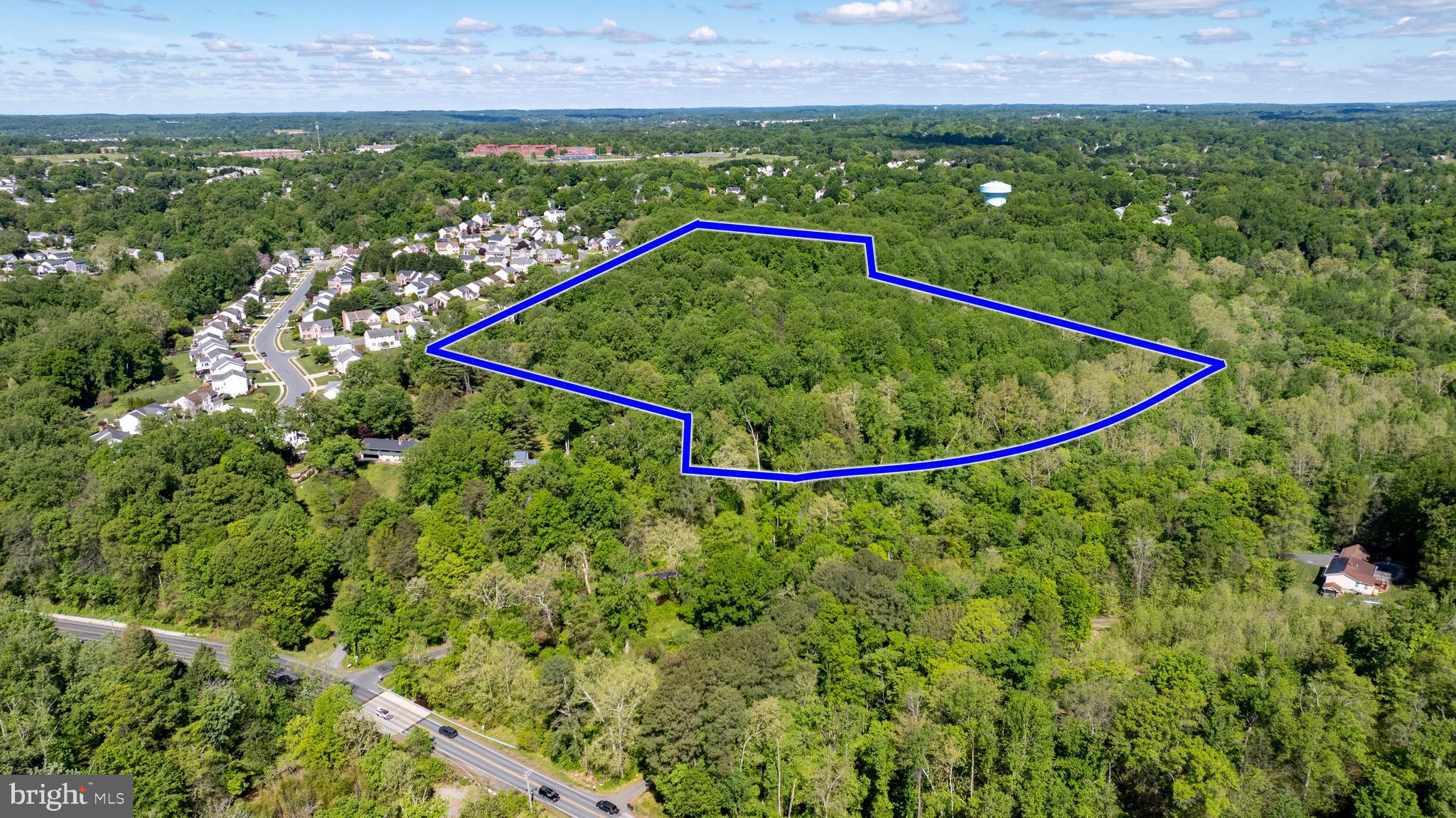 A Nature Lover's paradise!! 44 acres of mature woods located along Patterson Mill Road just south of Bel Air. One home can be built on this beautiful,  rarely available piece of land across the street from Bynum Run. The property hugs the waterway for about a third of a mile along the the one way section of Patterson Mill Road just prior to the intersection with Wheel Road. This unique woodland has been cared for by the same family for 50 years. Their stewardship has kept it in its' pure natural state and now it's time for a new owner. The property is protected from over development by a permanent easement to Harford land Trust, and the Maryland Environmental Trust. The conservation easement allows for ONE home to be built. A unique opportunity!!