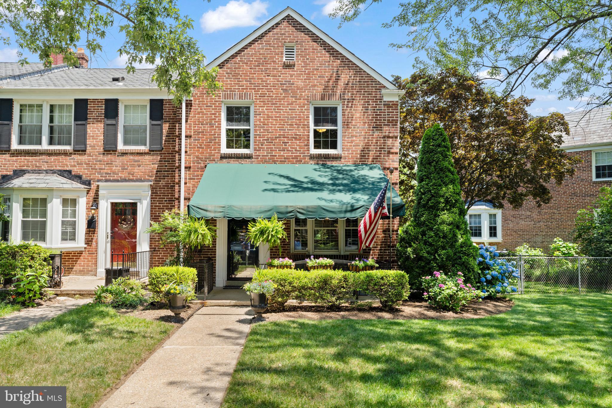 Welcome to 7101 Heathfield Road, a beautifully maintained end-of-group brick townhome in the heart of Rodgers Forge. Situated on a coveted corner lot, this home offers added privacy, abundant parking, a spacious backyard, and an inviting covered front porch perfect for relaxing and enjoying the neighborhood.

Inside, gleaming hardwood floors flow throughout the main and upper levels. The sun-filled living room features plantation shutters and opens to a formal dining room, creating a comfortable and functional layout. The updated kitchen has been thoughtfully renovated with an open-concept design, featuring a peninsula, updated countertops, flooring, tile backsplash, cabinetry improvements, and stainless steel appliances.

Upstairs, you’ll find three spacious bedrooms, including one with plantation shutters and another featuring custom built-in bookshelves. The renovated full bathroom showcases stylish finishes, custom built-ins, and updated fixtures.

The fully finished lower level provides valuable additional living space with a family room, a second full bathroom, a bonus room currently used as an exercise space, a laundry area, and multiple storage closets.

This home has been thoughtfully updated and meticulously maintained throughout ownership. Recent improvements include updated lighting, custom closet systems, interior and exterior painting, an expanded patio, porch enhancements, and numerous cosmetic updates throughout the home. Professional landscaping has been consistently maintained, creating beautiful curb appeal year-round.

Additional features include replacement windows, updated kitchen appliances, a sump pump, and well-maintained mechanical systems. The home offers the perfect blend of classic Rodgers Forge character and modern updates.

Beyond the home itself, you’ll love everything Rodgers Forge has to offer. This highly desirable neighborhood is known for its tree-lined streets, strong sense of community, and highly regarded public schools. Residents enjoy easy access to the Rodgers Forge Tot Lot, neighborhood events, local parks, and the shops, restaurants, and coffee spots along the York Road corridor. With Towson Town Center, The Shops at Kenilworth, Trader Joe’s, Whole Foods, and downtown Towson just minutes away, it’s easy to see why Rodgers Forge remains one of Baltimore County’s most sought-after communities.