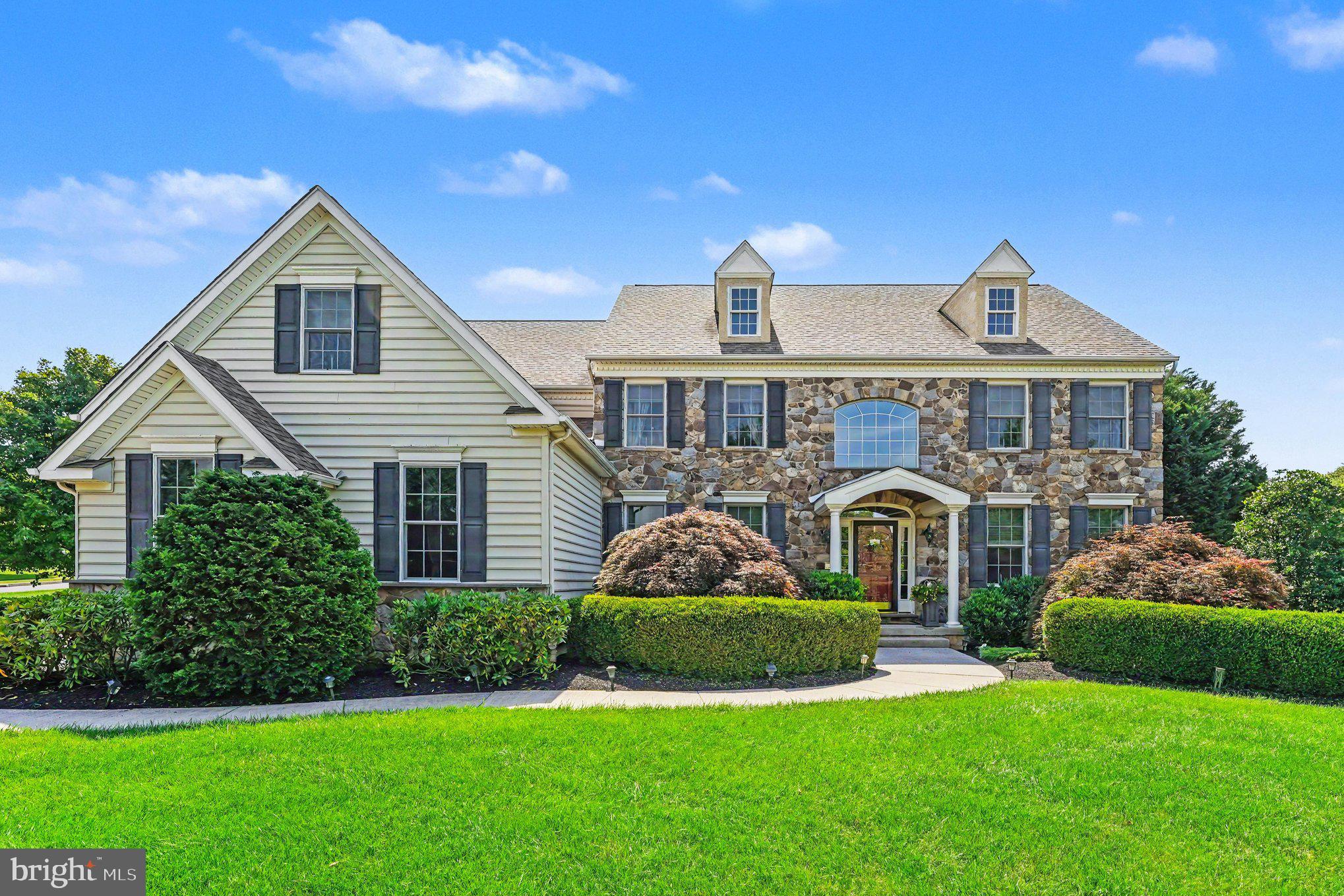 Welcome to 396 Augusta Dr in the community of Club View at Indian Valley. This gorgeous home built by W.B. Homes built in 2008 features 5 bedrooms, 4.5 baths and a 3 car garage. The kitchen offers a center island with a newer Viking 5 burner downdraft cooktop along with seating for 5. There is wine refrigerator, upgraded GE appliances, frosted glass pantry doors  a large eating area and a expanded area for seating and a door leading to the paver patio. There is also an entry door from the driveway which enters the kitchen hallway leading into the garage or the huge laundry room with cabinetry throughout that provides plenty of storage and also has a door leading to the rear patio. The family room has a vaulted ceiling and a stone front gas fireplace. There is also an office on this level.
The second floor boasts a main bedroom with a gas fireplace, multiple closets including a walk in closet(currently being used as an office), full bath with jetted soaking tub, stall shower and double vanity. There are 3 additional bedrooms, 2 serviced by a Jack and Jill bath and a hall bath. Each bedroom has recessed lighting.
The beautifully finished basement adds an additional 1500 square feet of living space that offers a 5th bedroom, kitchenette with abundant cabinet space with pull out shelving dishwasher, granite countertop island seating, full size refrigerator, and separate eating area. There are two large seating areas, one with an electric fireplace and there is also a full double entry bath with full shower and double bowl vanity.
This beautiful home has recessed lighting throughout, a wonderfully landscaped corner lot. In addition to this move in ready home, newer features include New roof 2019, 2 New HVAC units 2024, new water heater 2026,