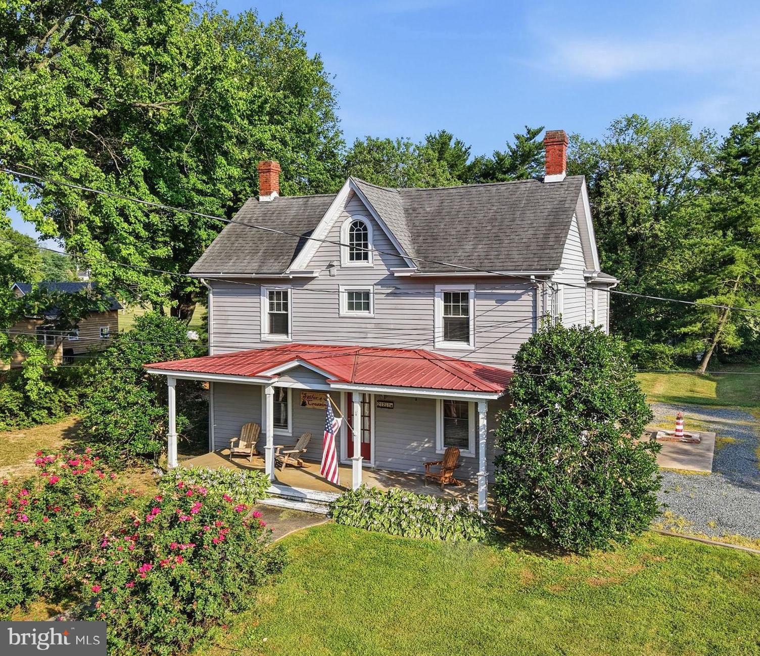 Beautifully updated while preserving its character, this charming home is ideally located just a short distance from the Rock Hall Harbor and Chesapeake Bay, offering easy access to waterfront dining, boating, and all the coastal charm Rock Hall has to offer.
Relax on the spacious front porch, or entertain on the screened porch, complete with electricity and plenty of space for outdoor dining.
Inside, the home seamlessly blends original character with thoughtful modern updates. The large country kitchen retains its classic charm while featuring updated stainless steel appliances. Off of the kitchen you’ll find the formal living and dining rooms, highlighted by beautiful built-in cabinetry and warm original hardwood floors that extend throughout the home.
This home offers a first-floor bedroom and an updated full bathroom, offering hard-to-find single-level living. Upstairs there are four additional bedrooms and a second full bathroom, providing plenty of room for family, visitors, or a home office. The large backyard is adjacent to the civic center, providing lots of open space, yet lined with trees for privacy.
Filled with warmth, charm, and modern comforts, this beautifully maintained home offers the perfect opportunity to enjoy life in one of Maryland's most beloved waterfront communities. Short distance to Main Street shops, many restaurants, marinas, and the Rock Hall beach.
