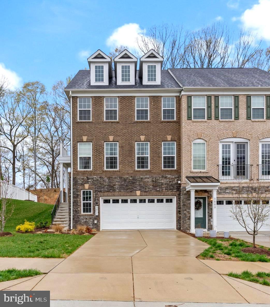 This exceptional end-unit townhome with a 2-car garage surpasses new construction standards. Boasting three bedrooms, two full bathrooms, and three half bathrooms across four levels, this home offers a spacious layout perfect for modern living. The main level features a bright and airy family room that seamlessly connects to the gourmet kitchen, equipped with high-end stainless steel appliances. The adjoining dining area is complemented by a convenient half bath. Accessed from the family room, a large, private, fully fenced-in yard provides the perfect outdoor space for relaxation, entertaining, or play.
Upstairs, you’ll find the luxurious primary suite with a gorgeous bathroom and large walk-in closet, two additional spacious bedrooms, another full bathroom, and laundry area. The fourth level features a versatile loft—perfect for a private home office, guest suite, or entertainment area and another half bathroom for convenience. The rooftop deck offers stunning peaceful views, making it an ideal space for relaxation year round.  
The fully finished lower level is a fantastic recreation area, perfect for family gatherings, entertainment, or as a multifunctional space for play and relaxation. It also includes an additional half bath for convenience.
With loads of natural light throughout, this home offers comfort and elegance in an exceptional location, just 15 minutes to Andrews AFB and downtown DC, and minutes from major commuter routes! Schedule your visit today!