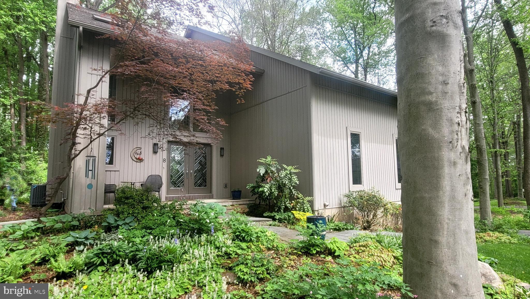 Exquisite custom built contemporary situated on a beautiful wooded lot at the end of a quiet cul-de-sac. Privacy and natural beauty but conveniently located 20 minutes from both Newark, DE and Kennett Square, PA. Award winning Avon Grove schools are just minutes away.  

The home was finely crafted with quality construction materials and high end fixtures. High ceilings and expansive Andersen windows & doors allow natural light to pour in throughout. The home is one of a kind! The entrance has a stunning three story foyer which opens to the window filled living room and adjoining sunroom. The kitchen has custom maple cabinets, granite countertops, and a huge walk-in pantry that connects to the large dining area with beautiful woodland views. A private office and bedroom (possible first floor primary) with en-suite bath completes the first floor.  The wrap-around first floor deck includes a screened porch and  serene views. The second floor has two full baths, laundry and three bedrooms. The luxurious primary bedroom suite  with vaulted ceilings includes a large walk-in closet and private bath, euro style large open tile shower, along with a private second story deck. All three baths are updated and sizable. The finished walk-out basement features a billiard room and exercise room with a large sliding glass door for natural lighting. Oversized 2.5 car garage with large workshop.  The  home is surrounded by beautiful low maintenance gardens and stately trees providing glorious blooms & color year round. An acre of woodlands behind the house provide the perfect place for a trail walk or kids tree house. 


Recent Home Improvements:   New Furnace/Heat Pump 2018, New Roof 2021, New Well Pump 2025, New Refrigerator 2024, New Washer/Dryer 2025 (Optional), Retractable Screens on side deck 2020, Freshly painted Kitchen, Dining, Master Bath, & Deck in the last 18 months, New Carpet in past 2 years: 3 bedrooms, staircase , New flooring lower level 2025/26, Replaced front lawn 2025
