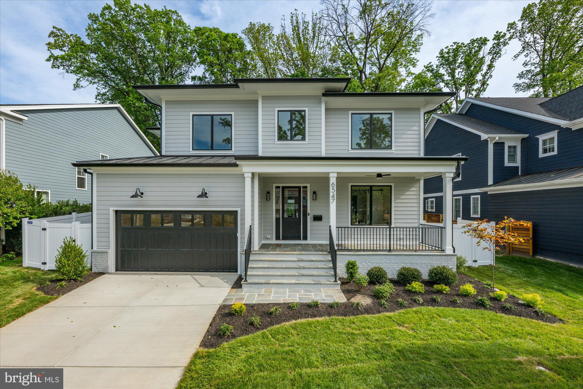 M-R Custom Homes presents this beautiful new home on a quiet street in Falls Church. This home features 7 bedrooms, 6 full bathrooms and one powder room with 6,067 square feet of finished living space over three levels and beautiful seven-inch white oak hardwood floors throughout the main and upper levels. The main level includes 10ft ceilings, and a beautiful gourmet kitchen with custom inset maple cabinetry, 2.5" quartz countertops, 48" Subzero refrigerator, 48" Wolf gas range, two Bosch dishwashers, and a built-in Wolf microwave. The kitchen opens to spacious great room with coffered ceiling and a gas fireplace with shiplap surround and flanking built-ins. Through the butler's pantry is an elegant formal dining room and living room with abundant natural light. A large screened porch with heaters and speakers provides an amazing outdoor living space overlooking the backyard. A private study with ensuite bathroom, a breakfast nook, a mud room with built-in cubbies, and an attached two-car garage complete the main level living spaces. The upper level is highlighted by a luxurious primary suite with dual walk-in closets with built-ins and a spa-like primary bathroom with heated floors, double vanities, stand-alone soaking tub, and heavy glass enclosed shower. The walk-up lower level includes a spacious recreation room with wet bar, an exercise room with rubber flooring, a bedroom with full bathroom, and a 2nd office space. The professionally landscaped 10,400 square foot lot is fully fenced in the back and includes an irrigation system. Convenient to downtown Falls Church, Tysons, and Haycock/Longfellow/McLean.
