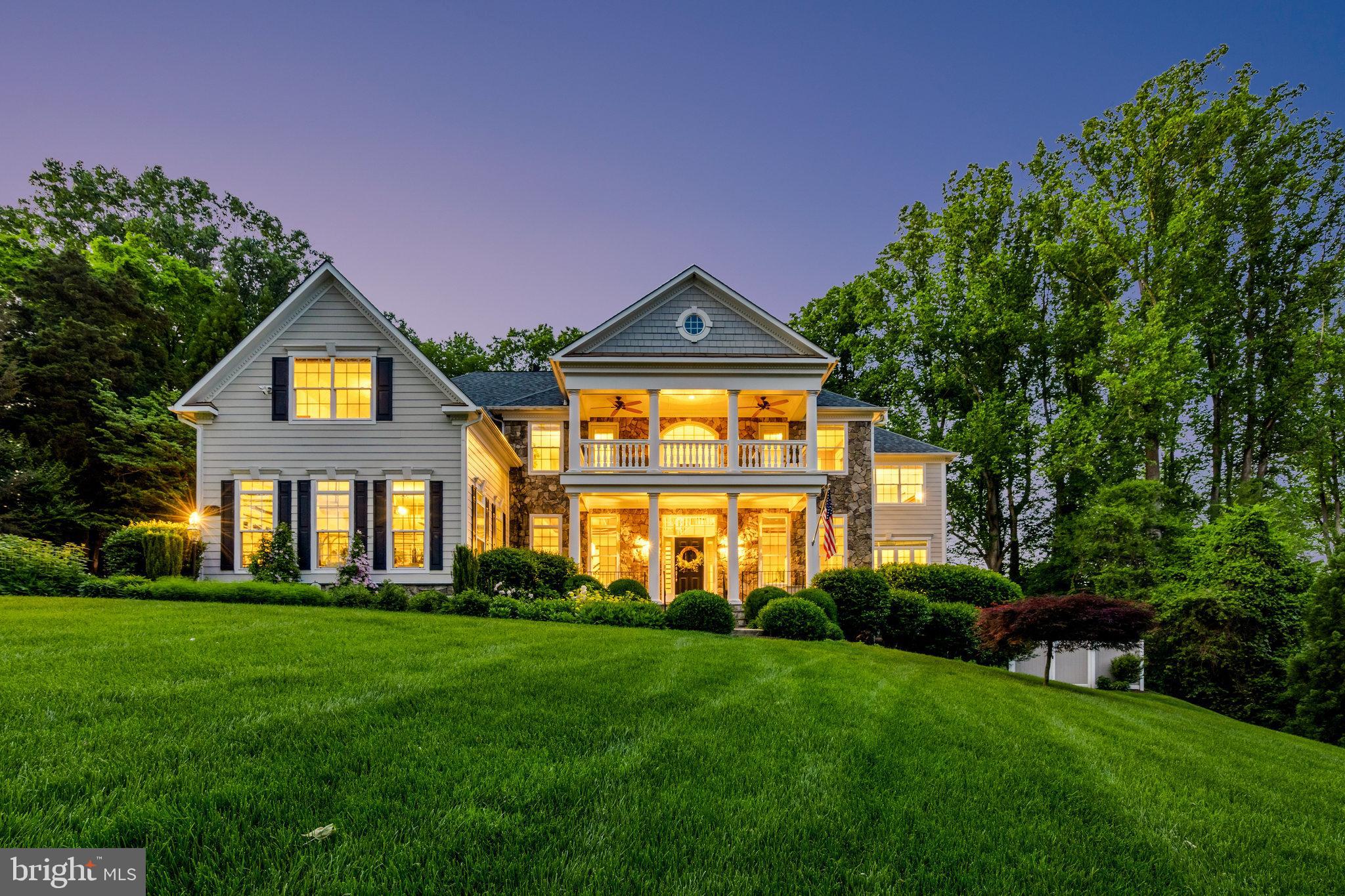 Nestled within Langley Forest, one of McLean’s most coveted neighborhoods, and situated on 1 acre of lush, manicured grounds offering an unparalleled sanctuary of sophistication and comfort, this exceptional custom home offers 7-bedrooms and 7.5 baths, 5 of which are located on the upper level, including a sumptuous primary suite with separate sitting room, gas fireplace, custom walk-in closets, beverage station and updated bathroom.  This private oasis offers an additional main level primary suite and lower-level guest quarters. An open floorplan with soaring ceilings and expansive windows bathes the living spaces in natural light throughout, and custom details such as coffered ceilings and crown molding provide refined elegance at every turn.  A separate, spacious main floor home office offers quiet garden views.  Enjoy the luxury, gourmet kitchen with professional appliances and craftsmanship, including, leather textured granite countertops, incredible amounts of storage and a walk-in pantry. The TimberTech deck, beautiful hardscape with waterfall feature, patios, and architecturally landscaped yard create a backyard for wonderful entertaining, enjoyment, and peaceful relaxation. Enjoy your view from the gracious southern-style front porch or covered balcony or walk out on the lower level to your spacious patio, surrounded by perennial beds and mature trees. Some marvelous features of this exquisite property include new flooring throughout, updated lighting and fixtures, 3-car side load garage with EV charging stations, a multi-zoned irrigation system, a state-of-the-art security system, a fenced back yard, whole-house electric surge protection, and expansive driveway for additional parking. Immaculate inside and out, move in ready! With its unrivaled blend of sophistication, comfort, and luxury, this extraordinary residence represents the epitome of refined living in one of McLean's most prestigious neighborhoods. Located within the boundary of some of the nation’s best schools, convenient to two international airports, metro and arteries serving the Washington DC and Northern Virginia areas. 
Churchill, Cooper, Langley. This property can be viewed by appointment or at the scheduled open house, June 2nd 1-4 PM. Please call for additional information or to set a private, confidential appointment.