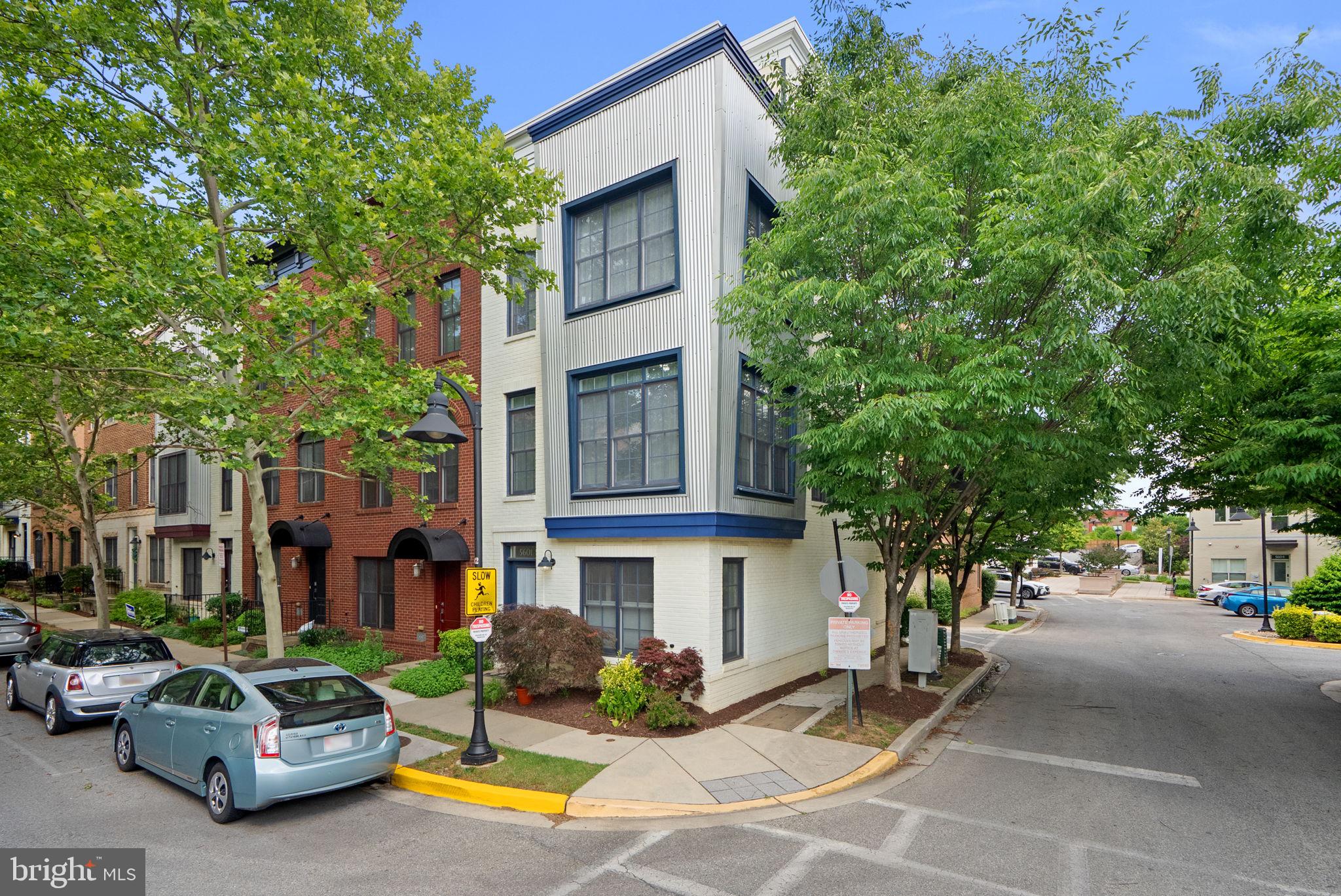 One of EYA's largest homes this beautiful corner townhouse is located in the wonderful Arts District of Hyattsville. Ease of living and a wonderful location here in Hyattsville - close to so much - in such a welcoming and progressive community with all it has to offer could put an end to your search! There is so much to love in this home- an entry level office space (or bedroom) and a large rear entry 2 car garage and 3 more bedrooms - all with ensuite baths! With mature trees providing shade and tranquility and a lovely roof deck for relaxing in the evenings or a cup of morning coffee....... EYA pioneered the open floorplan concepts and design here in the DMV - and this home shows it off! Tall 9-foot ceilings, and oversized windows flood the interior with light. Ample room sizes with closet and storage space make getting comfortable easy. The kitchen is opens to the dining and living areas - and makes entertaining easy!
The second floor primary bedroom has a walk-in closet, huge bathroom with a soaking tub and a walk-in shower and double sinks. Full size side by side washer and dryer located on the bedroom level make doing laundry convenient. The third bedroom and family room area on the upper level open the fantastic private roof deck - a fantastic place to relax and unwind. 
And of course, you are so close to SO MUCH! Vigilante Coffee, Franklins, Streetcar 82, Sangfroid distillery, Maryland Meadworks, Manifest Bread, Two- Fifty BBQ, Town Center Market, the Thursday Riverdale Park Farmers market, Busboys and Poets, Whole Foods and on and on and on.There is literally something going on every night of the week! 
And of course, access to the EYA fitness center in the old Lustine Auto showroom, and the outdoor pool. And of course, all the connections to the outdoors and outdoor activities- the Trolley Trail and access to local bike and walking trails, Bladensburg waterfront park with boat tours, canoe and kayak rentals!  
Metro is nearby, as are buses and the Riverdale Park Marc Train Station (day trip to Shepherdstown anyone??!!).
Check out the 3D virtual tour, the video and the pictures - and then come see for yourself!! 
This is a wonderful home in a great area - come by and have look!!