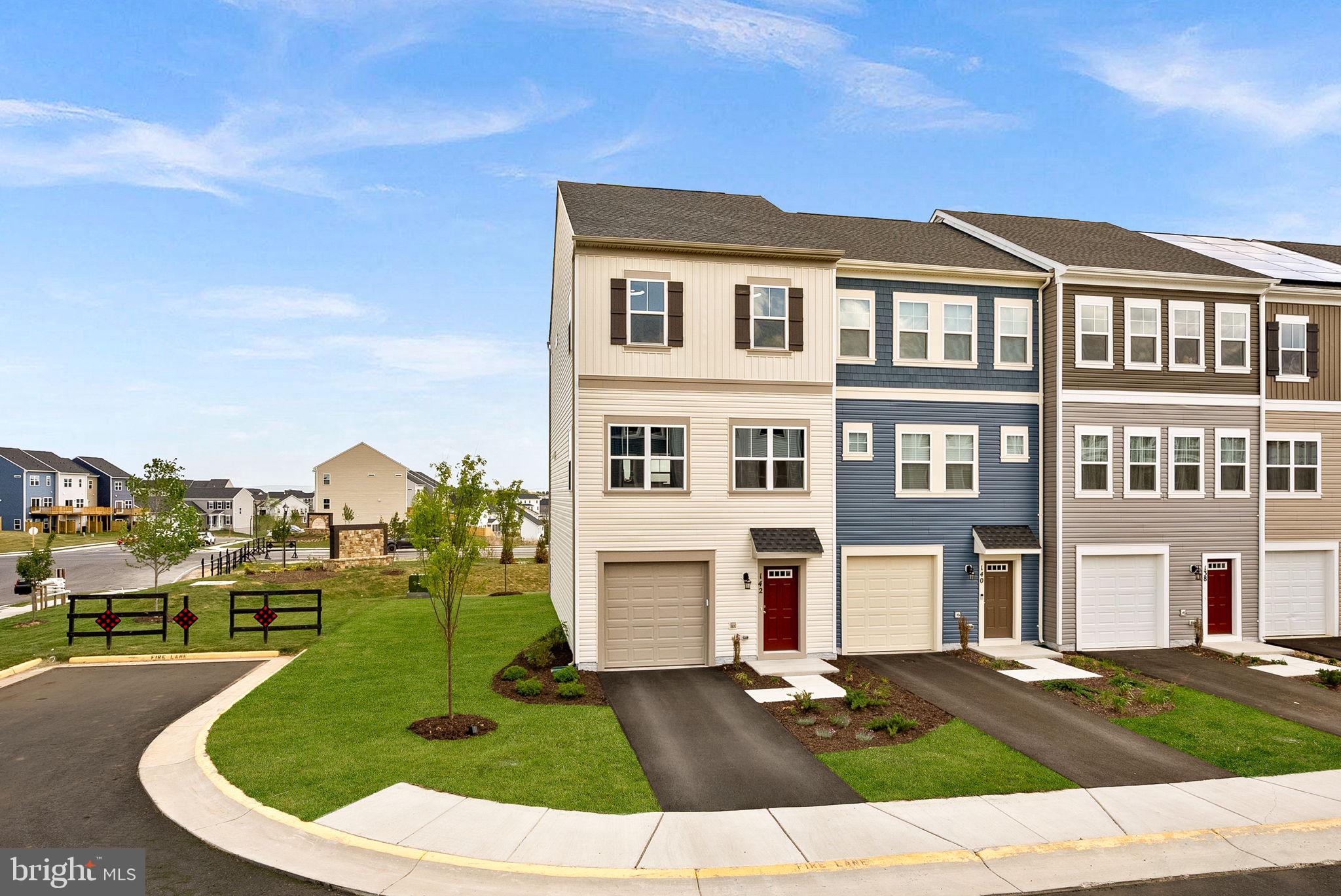 Bright and open 4-bedroom end-unit townhome with exceptional community amenities, nestled just outside of the Blue Ridge Mountains! Luxury vinyl plank flooring flows throughout all three levels. The gourmet kitchen is the heart of the home, featuring white Corian countertops, an oversized island with ample seating, gas cooking, a deep sink, stainless steel appliances, a pantry, and a separate breakfast area with mountain views. The open layout flows seamlessly into a sun-filled family room with large windows and a ceiling fan.

Upstairs, the spacious primary suite features a walk-in closet and a spa-like en suite bath with a soaking tub, separate shower, and dual sinks. Two additional bedrooms, a full hall bath, and convenient upper-level laundry complete the bedroom level. The walk-out lower level offers a 4th bedroom or versatile recreation space, along with a half bath, closet, and storage. The home also includes a one-car garage with opener.

Located in an amenity-rich community offering a 15,000 sq. ft. indoor sportsplex, private splash park, bike track, swimming pool, picnic pavilion, trails, dog park, on-site elementary school, and day care center. With its captivating views, convenient location, and hometown feel, Stephenson is the perfect place to call home. Enjoy a variety of outdoor activities nearby, including scenic hiking trails in Shenandoah National Park and picturesque drives along Skyline Drive. Situated just minutes from major commuter routes, shopping centers, and Downtown Winchester, this area offers the perfect blend of convenience and tranquility. Explore local restaurants, historic landmarks, and unique shops in Downtown Winchester, with easy access to I-66 and I-81 for commuting toward Northern Virginia and Washington, D.C. A wonderful home with space, comfort, and lifestyle amenities all in one!