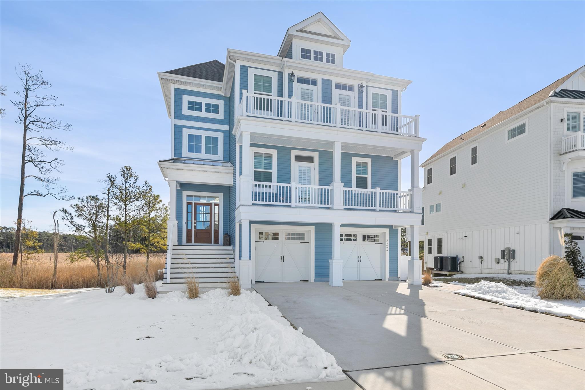 Modern Coastal living at its finest. Welcome to a lifestyle of effortless relaxation offering the perfect balance of luxury, coastal and family-friendly living. This bright airy, open - concept floor plan connects directly to numerous decks, and spectacular views of Love Creek and preservation area.  Community offers private pier, boat docking, boat - ramp, kayaking, fishing, community pool and exercise room Located in sought after Marsh Island Community representing the pinnacle of seaside living. This high-performance quality craftsmanship home has an abundance of options that include ultra-high energy efficiency, innovative floor plan, distressed white coastal engineered wood floors, wainscoting throughout, gourmet kitchen with stainless steel professional grade appliances, full wet bar in lower level for effortless entertaining. Owner has delivered personal touches that make it a truly special home in Model New Condition!!!