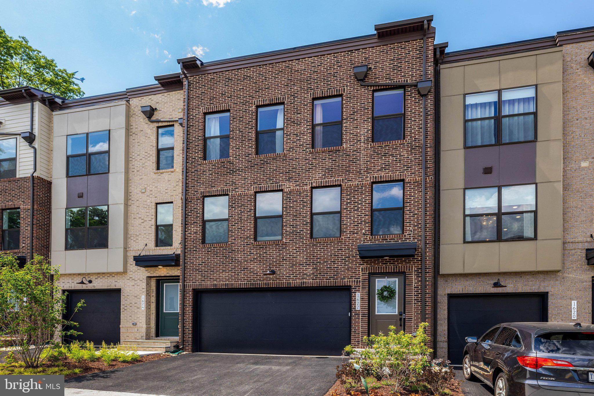 Only six months young, this stunning transitional townhome showcases exceptional craftsmanship and thoughtful upgrades throughout, with no expense spared. Perfectly positioned in one of the community’s premier locations, the home backs to mature trees and overlooks the charming Lake Anne community. Enjoy the convenience of spending Saturday mornings strolling to the farmers market, local cafés, and artisan shops just moments away. Spanning four beautifully finished levels, this 4-bedroom, 4.5-bath residence features wide-plank flooring throughout and offers the perfect blend of modern luxury, style, and everyday comfort. The home also features a spacious two-car garage with a sleek epoxy flooring finish, adding both durability and a polished touch. A truly exceptional opportunity not to be missed.