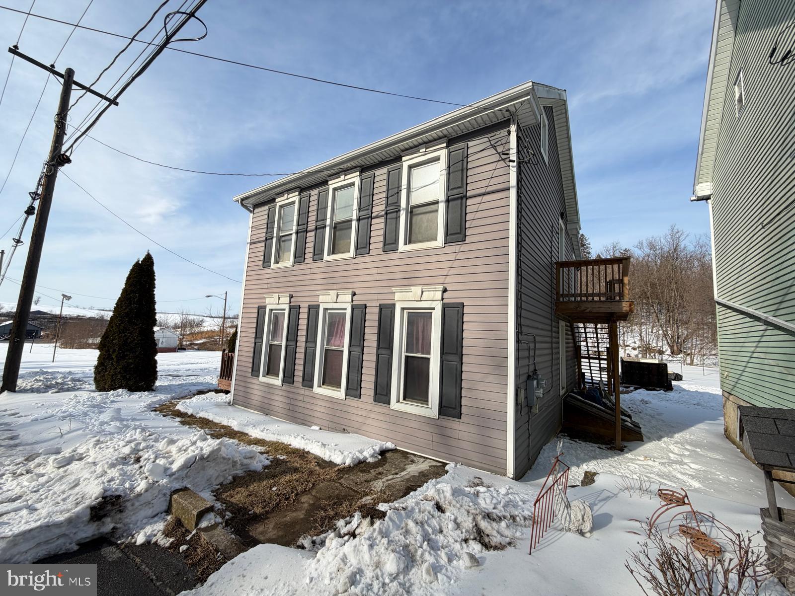 Location is everything! Situated on a high traffic street with excellent visibility and close to major highways. Property features two separate dwellings, ideal for owner-occupants, investors, or business owners. Live in one unit and rent the other, or operate a business with maximum exposure. Second unit is near completion all materials are on site and ready to finish( Over 6k in materials). Large garage with electricity offers potential for a third unit or business storage. Ample parking and strong income potential. Rare opportunity!