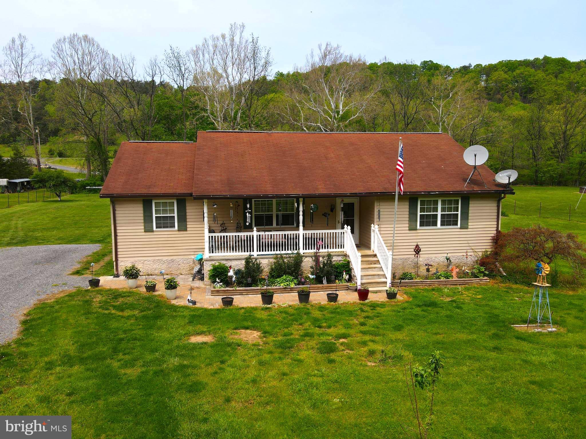 CALL NOW TO SEE THIS LOVELY RANCH STYLE ONE LEVEL HOME ON  TWO LEVEL ACRES  IN MEADOWLANDS SUBDIVISION.   PERFECT FOR  ANYONE WHO DOES NOT WANT TO  CLIMB LOTS OF STAIRS. UPON ENTERING THE LARGE FOYER, THERE IS A LIVING ROOM, KITCHEN/DINING COMBO, HALL BATHROOM, THREE BEDROOMS WITH THE MAIN BEDROOM HAVING A FULL BATHROOM. IN THE BACK YARD YOU WILL FIND  A GARAGE/WORKSHOP. BORDERING THE REAR OF THE PROPERTY  RUNS  MILL CREEK WHICH IS SOMETIMES STOCKED WITH TROUT. ENJOY THE MOUNTAIN VIEWS AND THE STARRY SKY IN THE NIGHT TIME.
THIS HOME IS LOCATED RIGHT OFF ROUTE 50 BETWEEN ROMNEY AND KEYSER. IF YOU ARE A GOLFER THEN YOU WILL ENJOY BEING ABOUT A MILE FROM THE 9 HOLE MILL CREEK GOLF COURSE. . SO LEAVE YOUR WORRIES FAR BEHIND YOU AND MOVE TO WILD WONDERFUL WEST VIRGINIA AND BECOME A MOUNTAINEER!!!!
