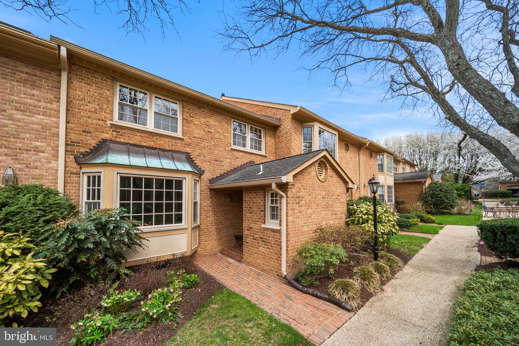 Welcome to 7308 Aynsley Lane—an elegant three-level, all-brick townhome with a two-car garage, tucked within the quiet and well-maintained McLean Court community in the heart of McLean. Ideally located less than a mile from the McLean Metro Station, this beautifully updated and meticulously maintained home offers both convenience and refined living.
Inside, the spacious floor plan features gleaming hardwood floors throughout the main and upper levels and abundant natural light. The recently renovated kitchen is designed for both everyday living and entertaining, showcasing new cabinetry, granite countertops, stainless steel appliances, recessed lighting, and a large center island. A rear door leads directly to the private brick patio—an ideal outdoor space for relaxing or hosting guests.
Just off the kitchen, the inviting family room features a wood-burning fireplace, skylights, and a large picture window overlooking the peaceful patio, creating a warm and comfortable gathering space. The sun-filled living room offers a charming bay window, while the formal dining area is accented with elegant French glass doors.
The upper level is highlighted by the spacious primary suite, a true retreat featuring a large walk-in closet, additional linen storage, and a brand-new spa-inspired bathroom. This luxurious bath includes a jetted soaking tub, a frameless glass walk-in shower with upscale fixtures, and a large double-bowl vanity with an oversized mirror and statement lighting. The shower wall is fully tiled, creating a sleek, modern look that makes the space feel like a five-star resort. The remainder of the upper level includes two additional bedrooms, a full hallway bathroom, and a conveniently located laundry area.
The lower level provides exceptional versatility with a private fourth bedroom or office/study featuring a cedar closet and an adjoining full bathroom. A sizable recreation room offers built-in shelving, a second wood-burning fireplace, and a wet bar—perfect for entertaining or relaxing. Additional storage areas provide plenty of practical space.
Residents enjoy a low-maintenance lifestyle with exterior and yard maintenance handled by the community, allowing more time to enjoy everything the area has to offer. Just minutes away are premier shopping, dining, and entertainment destinations including Tysons Galleria, Tysons Corner Center, and the nearby Wegmans. Downtown McLean’s charming shops and restaurants are also close by.
Commuters will appreciate easy access to major routes, the Silver Line Metro, and both regional airports including Ronald Reagan Washington National Airport and Washington Dulles International Airport.