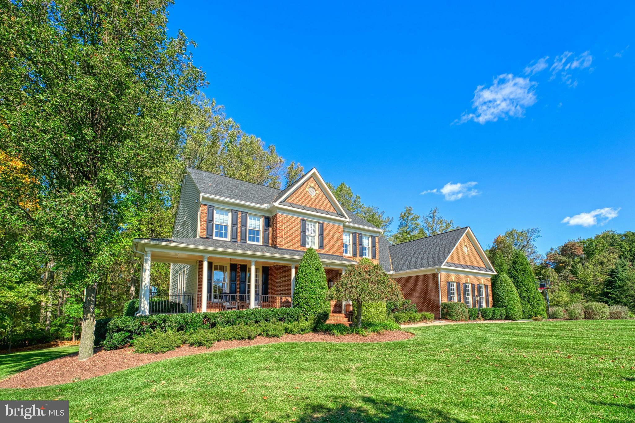 This immaculate colonial in sought after Golden Springs community is set on a serene 3-acre lot at the end of a peaceful cul-de-sac, offers stylish renovations and is fully move-in ready. The welcoming front porch is the perfect spot to enjoy the sunrise or unwind with friends and neighbors. With its spacious, open floor plan, this home is designed for both comfortable everyday living and effortless entertaining.
Within the past two years, the kitchen and bathrooms have been completely updated, fresh paint has been applied throughout, and a new furnace and hot water heater have been installed. Additional updates include outdoor lighting, new roof ,gutters, and an epoxy-coated garage floor, further enhancing the meticulous upkeep of this property.
The generous sized  family room, featuring a cozy wood-burning fireplace, flows seamlessly into the updated kitchen. It also offers  access to the screened in porch and expansive deck leading to the pool area. Gorgeous sand in place hardwood floors, throughout  intricate crown molding, and sleek metal basket balusters on both staircases add elegance throughout the main and upper levels.
The luxurious primary suite features a tray ceiling, a spacious walk-in closet, and a newly renovated spa-like bathroom with a soaking tub, dual vanities, and a separate shower. The second bedroom includes an ensuite bath, while bedrooms three and four are connected by a Jack-and-Jill bathroom. Each bathroom has been freshly updated with new tile, fixtures, and paint.
The fully finished lower level provides even more space, including a wet bar, game area, recreation room, full bath, and media room. Outside, the home offers a three-car side-load garage with ample storage and a large paved driveway for additional parking.
The beautifully landscaped backyard is a private oasis, featuring a fenced-in gunite pool with a Pebble Tec coating, diving board, waterfall, and hardscape. Surrounded by wrought iron fencing and lush greenery, the pool area enjoys full sun exposure throughout the summer. The screened-in back porch is a tranquil spot to relax and take in the sounds of nature and the beauty of the surrounding flower gardens.
Located in a community with no HOA (just covenants) and convenient access to the W&OD bike trail, this stunning home offers the perfect combination of elegance, privacy, and convenience.
Floor plans, plat, and covenants in documents. Potential  30 -45 day rent back needed .Offers will be reviewed Tuesday ,October 29th at 5:00.