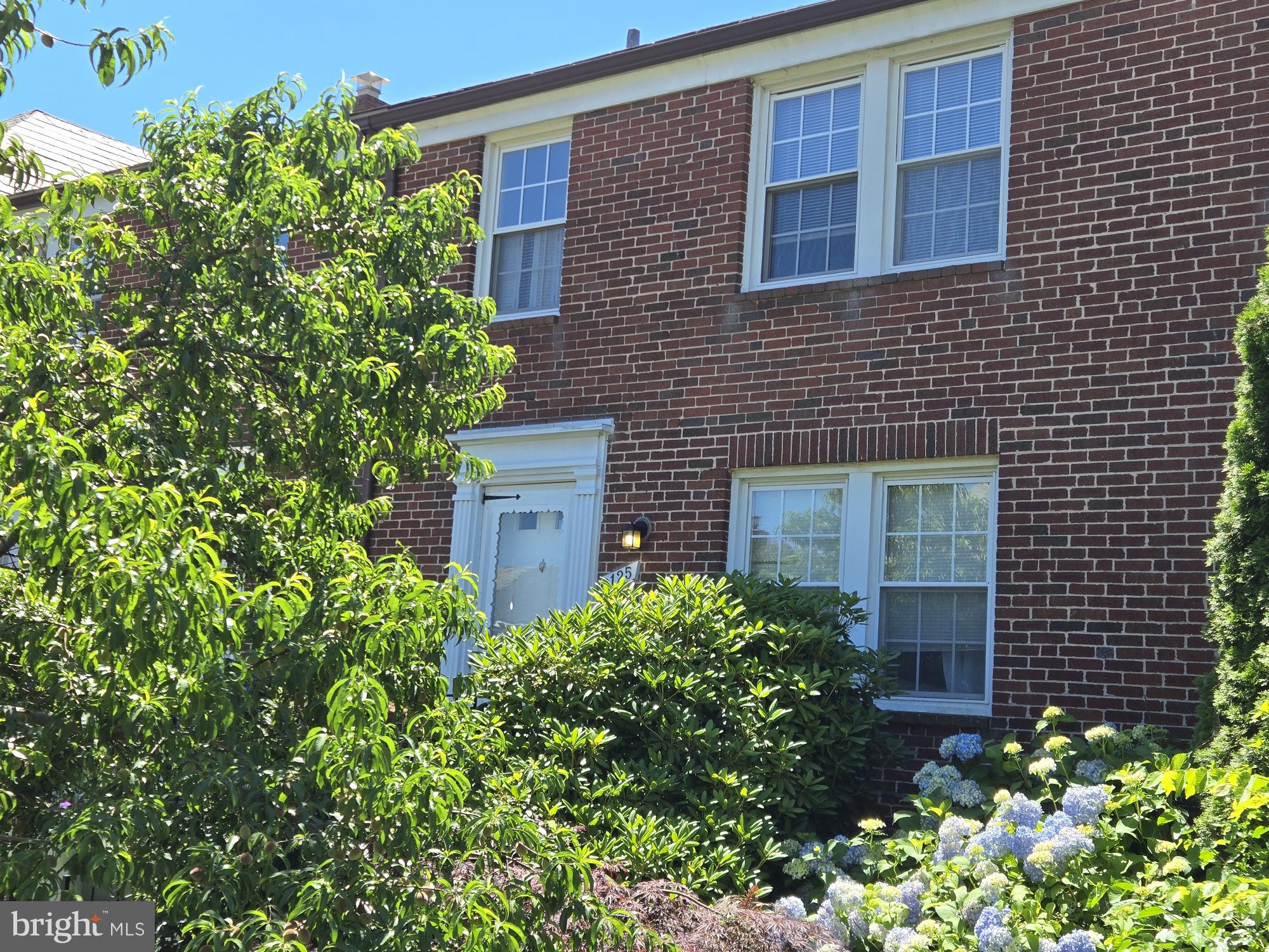 Enjoy all the benefits of living in Academy Heights.  This 3 bedroom 2 full bath all brick home has a quaint rear balcony, and a walk out basement is tucked away in the community.  Upon walking up to the home, you will see a beautiful peach tree that has been enjoyed for years.  The front stoop was redone.  The solid wood front door is a great introduction to the traditional style of home.  This 3home has been updated by the owner who has paid special attention to the details.   The home includes original hardwood flooring on two floors oozing the character with tastefully stenciled hardwood stairs.  The home has been freshly painted with a beautiful neutral paint which makes the home light and bright ready for a new owner.  The kitchen had a complete facelift in 2026 including new shaker white cabinetry complimented with darker above counter cabinetry,  dark wood butcher block counter top, extra cabinetry, neutral tile back splash, stainless steel sink and appliances including a vented range hood, and gorgeous patterned porcelain floor time.  The kitchen sings with harmony of the selections and feels new, but also fitting to the character of the rest of the home.  The kitchen leads to the balcony to enjoy peaceful evenings or a good cup of coffee.   The second level includes three nice sized bedrooms with new ceiling fans, and a remodeled bath with porcelain design tiles, and pedestal sink.   The lower level is an open space for entertaining with carpet and leads to the back of the home.  There is a 2nd full bath in the lower level and a separate laundry and utility area.  The laundry area also includes a laundry sink and folding station.  The entrance to the fully fenced rear yard is also on this level.  As a bonus, the Seller has also replaced the non-glamorous items such as the water heater and HVAC both over the past few months.  The slate roof  has also had a tune up.    Schedule an appointment to see this special home ready for the next owner to love just as much as the Seller has.