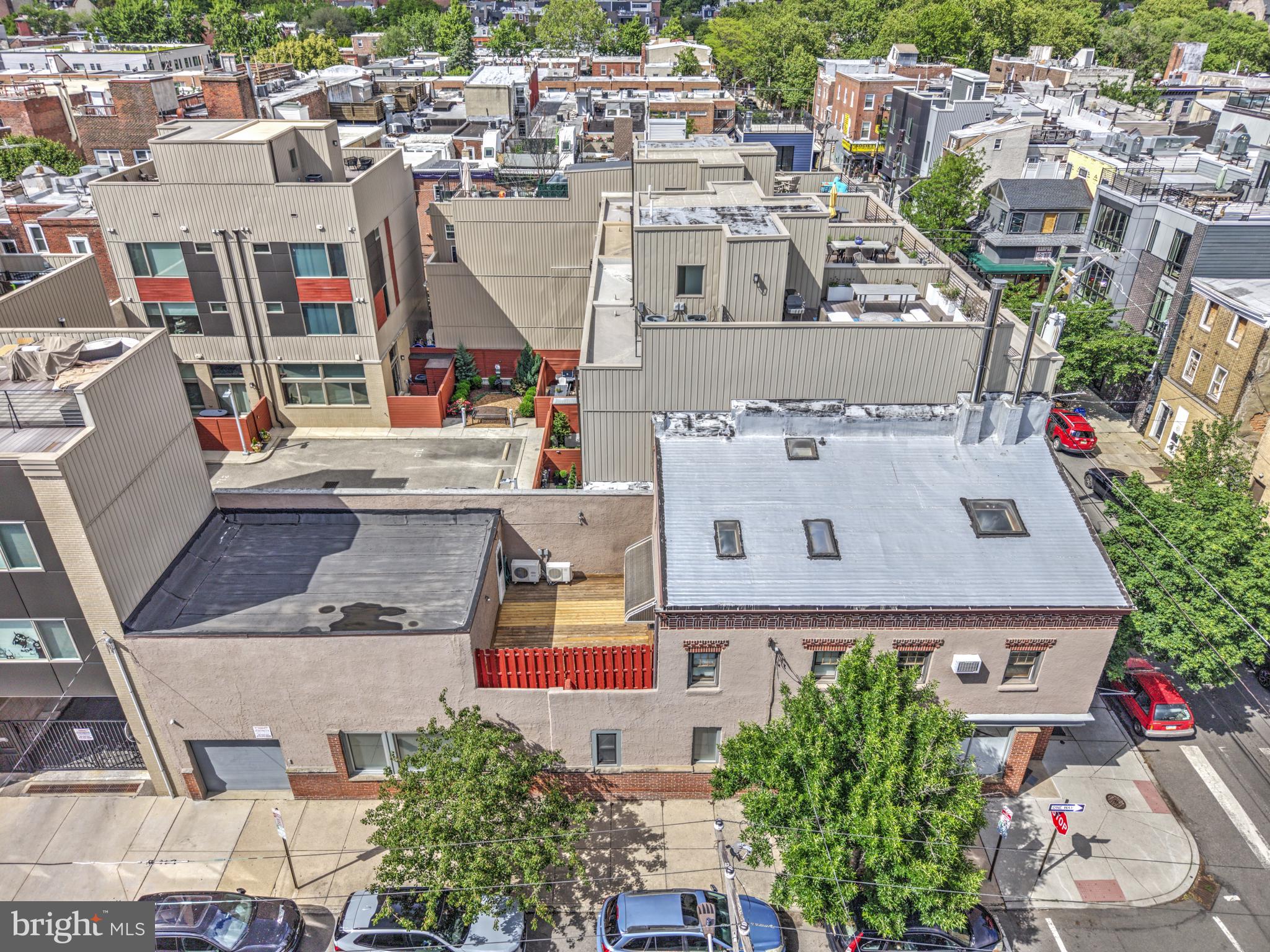 Prime investment opportunity in this exceptionally maintained mixed use corner property with one significantly improved commercial space with attached garage, and one custom one bedroom + loft, bi-level residence with multiple private outdoor spaces and separate entry, lovingly named SKY HOUSE. This property is well positioned on a high traffic corner in Queen Village, coveted by businesses for its access to sophisticated clientele and by residents for its access to superb neighborhood offerings in highly sought-after Meredith catchment. Capitalize on local demand by offering the existing units as-is, at increased rents with minor renovation, or by development of two additional residential apartments as permitted by right.  This property not only serves as a reliable income-generating asset but also positions you for long-term growth in a thriving market. Gross Potential Rent $72,000 as-is.