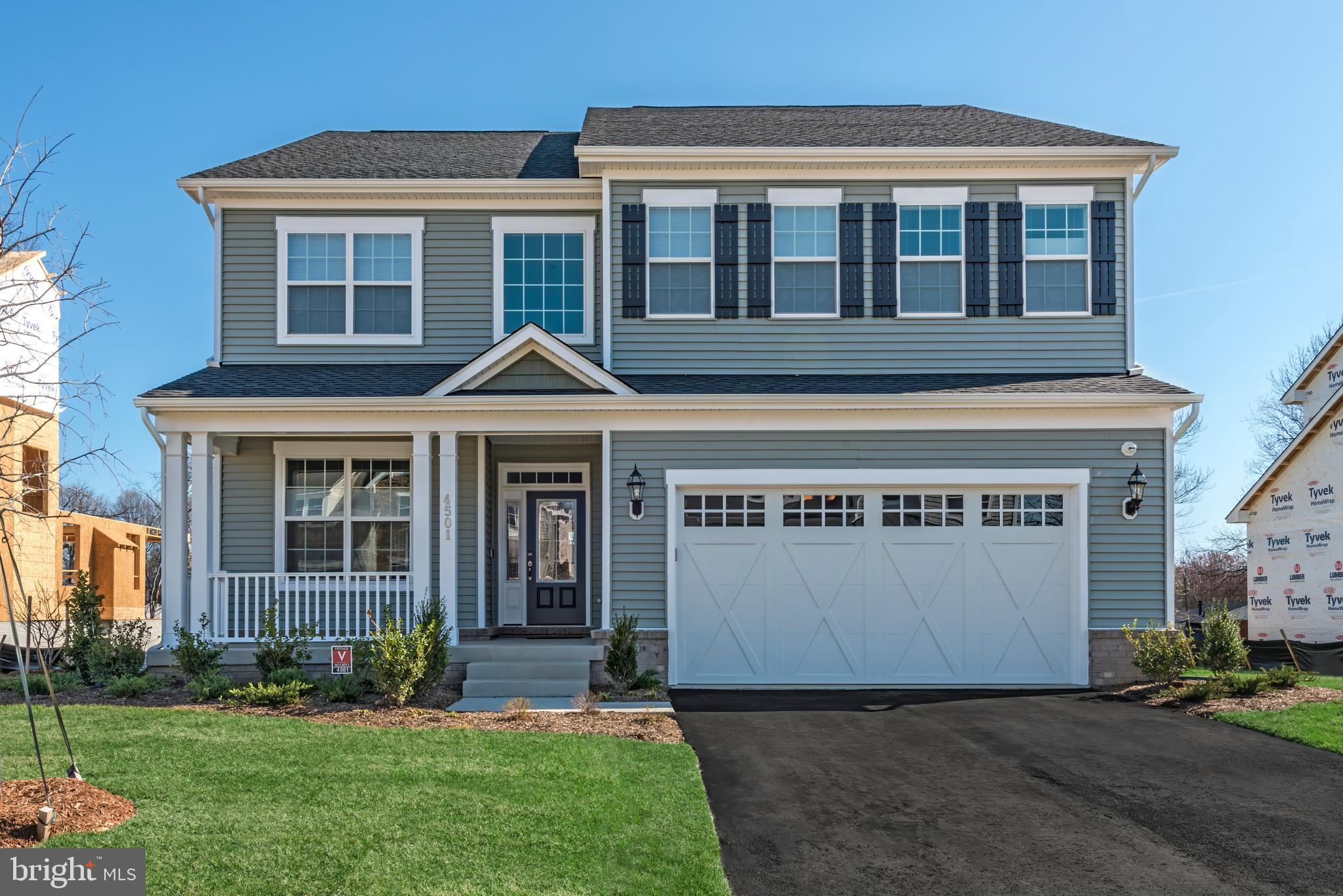 QUICK  MOVE IN -ACT NOW! MOVE IN SPRING! Don’t miss this rare chance to secure a brand-new single-family home in an exclusive community just off Hooes Rd in Lorton. With only 5 homesites available, opportunities are extremely limited! This stunning Taylor craftsman design offers an inviting open layout, elegant stone exterior, rear loggia, and a luxurious second-floor owner’s suite. With 5 bedrooms, 3 baths, and a spacious front-load 2-car garage with extended driveway, this home showcases an impressive array of high-end features throughout. A main-level bedroom with full bath comes included—perfect for guests or multigenerational living. The usable backyard backs to preserved wooded areas, creating a private, serene setting for outdoor living and entertaining. Take advantage of special financing options available now—this is your chance to lock in great terms and start personalizing your home. Interior images may include virtual staging or depict previously built homes of similar style that may have been modified.