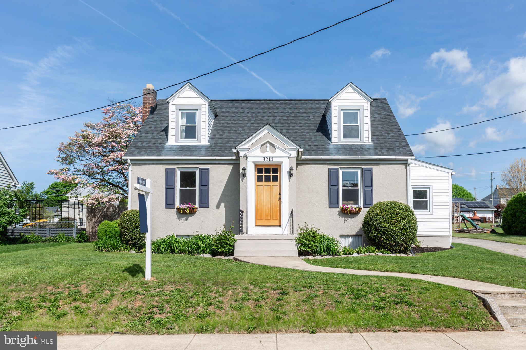 Welcome home to this charming Cape Cod nestled in the heart of Manchester! Thoughtfully updated and move-in ready, this home offers a comfortable layout with three bedrooms, one full and one half bath, a spacious backyard perfect for play or entertaining, and both driveway and street parking for added convenience. Inside, the main level features a generously sized dining room and a spacious kitchen with an island, offering plenty of room for cooking, gathering, and everyday living. Just off the living room, you’ll find a bright mudroom, perfect as a drop zone, reading nook, or small home office, complete with a new door. The primary bedroom is also located on the main level and includes an attached half bath. Upstairs, you’ll find two additional bedrooms and a full bath. The basement includes a partially finished room with a bar area, ideal for a game room, playroom, or extra living space, as well as a dedicated laundry area. Step outside to enjoy the large backyard, fully enclosed with a privacy fence. Recent upgrades include a newer roof and water heater. Enjoy the convenience of being close to local shops, schools, and commuter routes while still savoring the quiet, small-town feel. Schedule your showing today!