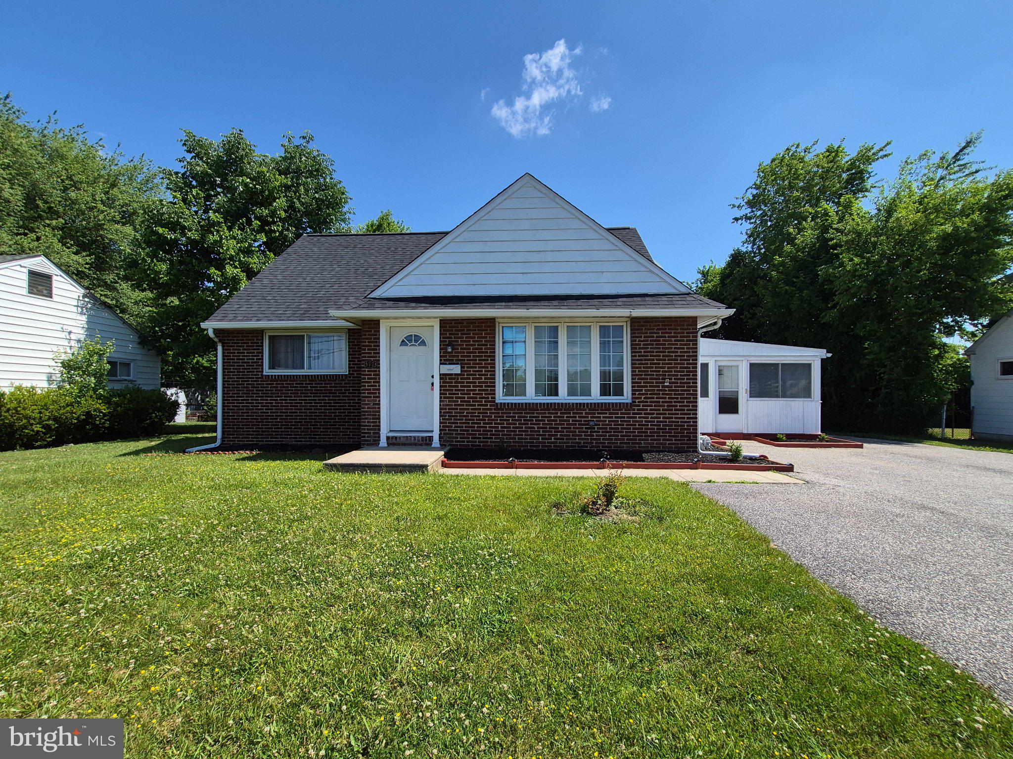 Welcome to your charming new home! With 4 spacious bedrooms and 3 full bathrooms, this Cape Cod offers plenty of room to enjoy inside and out. Recent upgrades include new roof, new flooring, and fresh paint. The main level begins with an inviting living room and eat-in kitchen with access to the enclosed porch for lounging or dining al fresco in all weather. This level also includes 2 bedrooms with new light/ceiling fan fixtures and full bathroom with tub shower. Upstairs, you'll find 2 additional bedrooms and another full bath. Don't forget the partially finished basement with 3rd full bathroom and laundry hookups. Step outside to discover a level lot with yard space surrounding the home. The rear yard is fenced, perfect for outdoor gatherings or gardening. Parking is a breeze with a detached garage and ample driveway space for multiple vehicles. This property is an ideal choice for anyone seeking a welcoming place to call home - don't miss it!