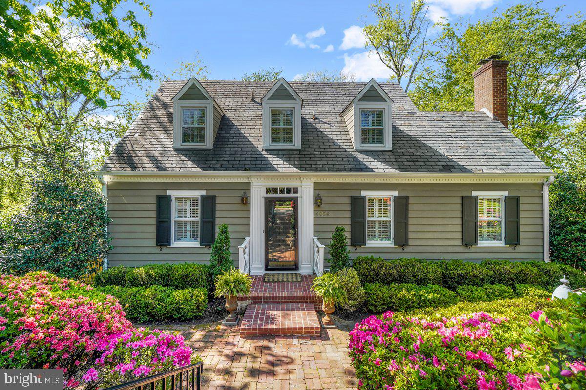 WOW WOW WOW! The quality features in this property are unending- gracious 1940 architecture with carefully curated rear 3 story addition! With a traditional entry foyer, formal living room with fireplace, separate sitting room, dining room and study to start… the former kitchen is now a pantry/ mudroom (think catering kitchen) and the Great Room addition features a magnificent Dove White, LiebHerr, Thermador, Bosch kitchen and family room!  Custom Built-in's throughout!
Upstairs there are two separate wings connected by a landing transition – one side has three bedrooms and full bath, while the other features a laundry and sumptuous master suite. Here there are separate dressing rooms, marble bath and oversized bedroom! The lower level which is above grade has an office, guest suite with full bath, utility room with second laundry and a recreation room opening to back yard. 
The wraparound exterior deck holds a crowd for entertaining, the front patio is private and welcoming. The oversized one car garage and off-street additional parking make this the full package! Nothing to do here!

6028 Grove Drive Details 4/28/22 Information provided by Owners
Three story rear addition (2012)
Three HVAC- original house (2021), addition (basement and 1st floor) 2012, Master Bedroom (2012)
Two Hot Water Heaters- Addition (2012), Older Portion of House
Two Washers and Dryers- Basement and Bedroom Level
Two Dishwashers- Paneled Bosch in Kitchen and 2nd in Pantry (2012)
Kitchen Refrigerator (Paneled Lieb Herr) (2012), second in pantry, third in basement
Thermador Gas Range- 6 burner (2012)
Thermador Dual Ovens (1 regular convection oven and 2nd can be used as a microwave or an oven, and
   Warming drawer (2012)
Wood burning fireplace in living room- liner replace a few years ago, recently cleaned
French drains have been installed- sump pump is outside (2019) to right of house near chimney- no issues with water
Garage is extra large- fits 1 car, work bench, storage
Cedar Closet
Storage Closet
Floored Attic access by pull down stairs in 2nd bedroom
House front exterior is clapboard wood siding and addition is Hardiplank (cement board)
Landscape Architect design- installed low maintenance yard/ garden
Updated landscape lighting (2022)
Irrigation System- 7 zones- entire yard is covered
Alarm System
Slate roof (original) on front of house and asphalt shingle on addition (2012)
Wired for Dolby 5.1 sound
Terracotta Sewer Pipes replaced in 2012
Information deemed reliable but not guaranteed.