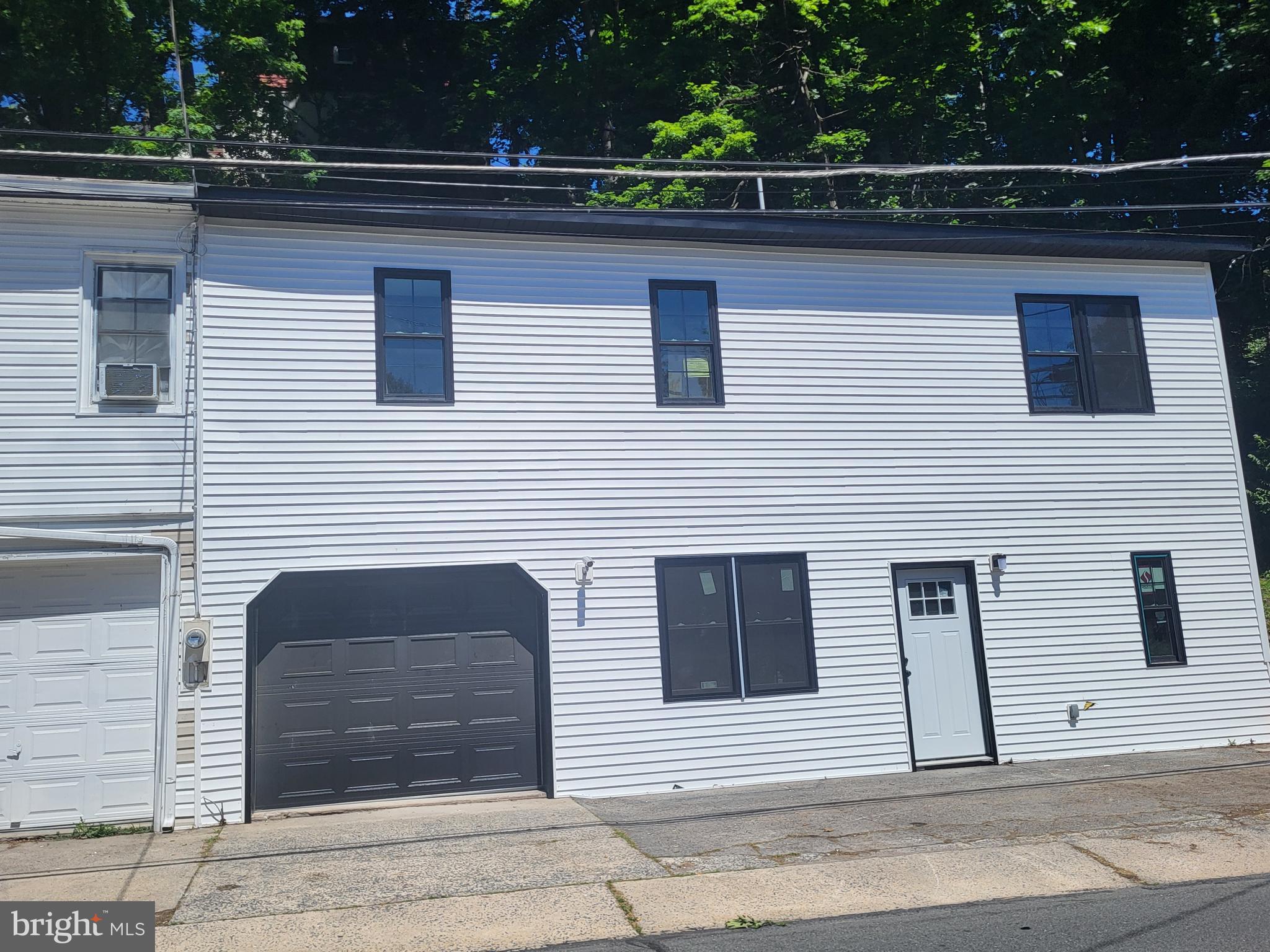 Check out this unique property in the heart of Mohnton. This end-unit has been totally remodeled with a new roof, windows & doors,
Kitchen, Bath, Flooring & Paint. Lots of natural light in the two large Bedrooms, Kitchen with new appliances and center island. Main
floor Laundry Room. Lower-level Garage. New HVAC with Central Air. Governor Mifflin Schools.