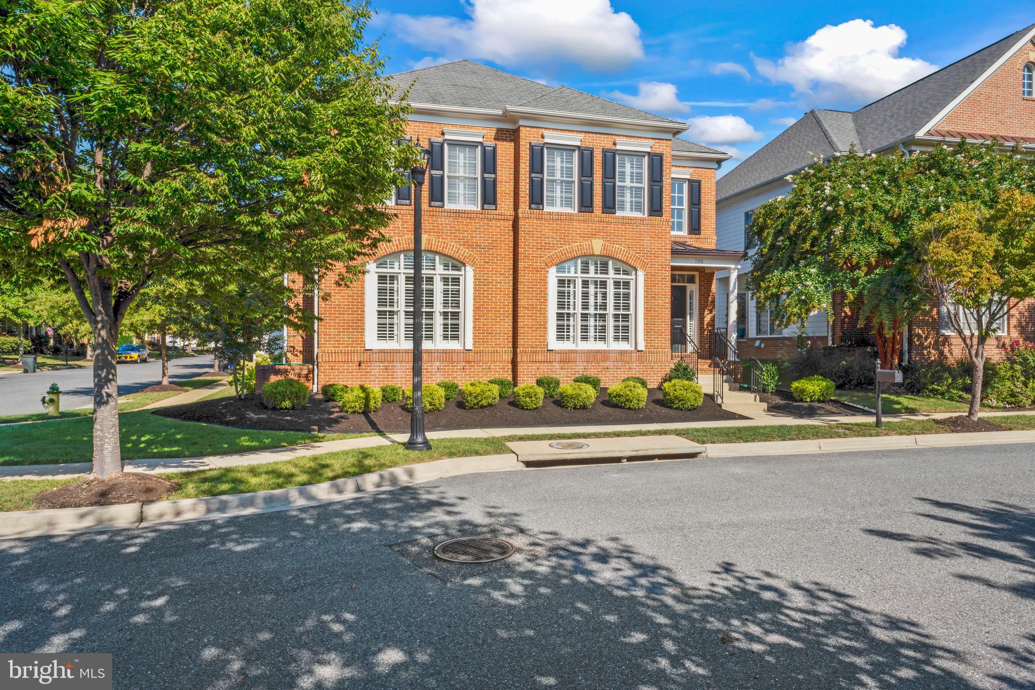 Welcome home to your Oasis in Kingsport Annapolis! Quality built by Basheer and Edgemoore with builder upgrades as well as personal upgrades from the homeowners...You can definitely see pride in ownership as you walk into this sun-filled home. The inviting 2 story foyer greets you into this lovely 4 bedroom 4.5 bath home that has so many features! From the plantation shutters throughout, to gleaming wood floors, recessed lighting, crown molding, chair molding, to updated patio installation, updated AC units with furnace, even a new smart 2 car garage! The separate dining room is perfect for hosting guests during larger get togethers, or enjoy your meal in the Eat in kitchen area. The beautiful kitchen has a center island that features a cooktop, w/double wall ovens, granite countertops, pantry, and all Stainless steel appliances...the kitchen flows seamlessly into the family room, perfect for everyday living and
entertaining. The 2-story family room has a gas fireplace with a wood mantle, and a wall of windows that
drenches the room in natural light! Main level also features an office, laundry room w/utility sink & built-ins, access to the 2 car garage, as well as the powder room. As you make your way upstairs, The primary suite boasts 2 walk-in closets w/built-ins, a sitting room, and a large primary bath w/sep soaking tub and shower. 2nd bedroom has an en suite full bathroom, and 2 other bedrooms that share a Jack-n-Jill Bathroom. The lower level conveniently has the 4th full bathroom, rec room, plenty of storage space, and an egress window that would be the perfect place to add your 5th bedroom! The Backyard is fully fenced for privacy and can be accessed from the family room or the driveway. The rear entry 2-car garage and driveway keeps your cars out of sight. The Kingsport community offers walking/jogging/ biking trails, and water access on Crab Creek with a kayak dock. 2 playgrounds (one of which is conveniently located directly across the street from this home). Pool (also walking distance from the property), pool house, & hot tub! Close to Historic Downtown, US Naval Academy, shopping, dining, and recreation. Easy access to commuter routes Rt 50 & Rt 97, to Washington DC, Baltimore and Eastern Shore. You won't want to miss this and thanks for stopping by!