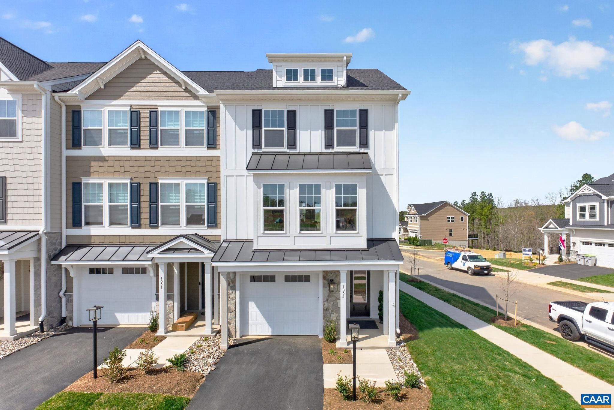 This end unit Holly townhome in The Grove at Brookhill is starting contruction soon with a scheduled completion in Summer 2026. Located in a newly released section of the neighborhood with easy access to Route 29, this three-level home offers a smart, functional layout. The first floor includes a private bedroom with a full en suite bathroom and an attached 1-car garage. On the second floor, the open main living area includes a galley kitchen, dining space, family room, walk-in pantry, half bath, and access to the rear deck. The third floor features a hall laundry closet, a spacious primary suite with a large walk-in closet and private bath with shower, plus two additional bedrooms and a full bathroom. This home will now includes a 4th floor loft and rooftop terrace! Photos are similar model home and may show optional features. Virtual staging is provided for inspirational purposes only.,Painted Cabinets,Quartz Counter,White Cabinets