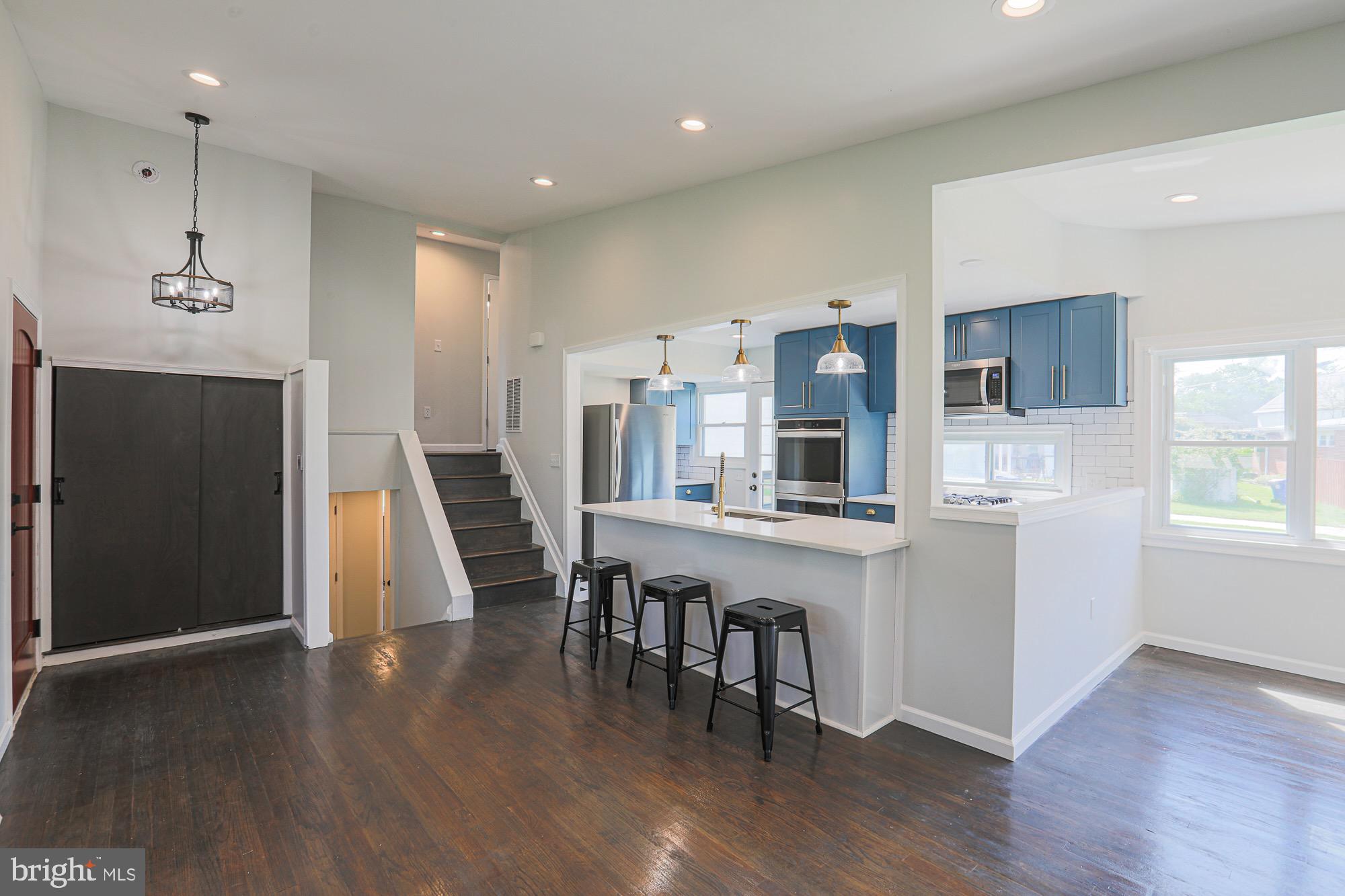 A wonderful 4 Bedroom  3.5 Bath  Pikesville Mid-Century Style home completely transformed with quality features and attention to every detail by Rachel Kessner Interiors.  So much value in this home with new electric and plumbing systems, smart thermostat, ring doorbell security, spray foam insulation throughout and sound proofing attenuation between all bedrooms. The interior is completely new and every inch of the inside and outside has been freshly painted.  Some of the gorgeous design elements begin with the raised square lattice on the Dining Room wall, refinished hardwood flooring, country front door, barn doors and decorative lighting.  The gourmet Kitchen, located central to the Living Room and Dining Room’s open floor plan (perfect for entertaining a large group) has all new stainless steel appliances, quartz countertops, custom back splash, double stainless steel square sink, two dishwashers, double wall ovens, gas cooktop and counter seating.  Three Bedrooms grace the second floor with two spectacular Bathrooms (one being in the primary Bedroom) lots of storage closets, and vaulted ceilings.  The fully finished Basement has luxury vinyl flooring, a Bedroom with egress windows, a full Bathroom with tub and glass enclosure as well as a half Bath with impressive large tiles and bowl sink, a laundry/play area and steps that lead to the private landscaped and level backyard with a concrete patio, special outdoor spot lights, storage shed and long paved driveway.  Nothing is missing from this elegant and unique rental home except you.