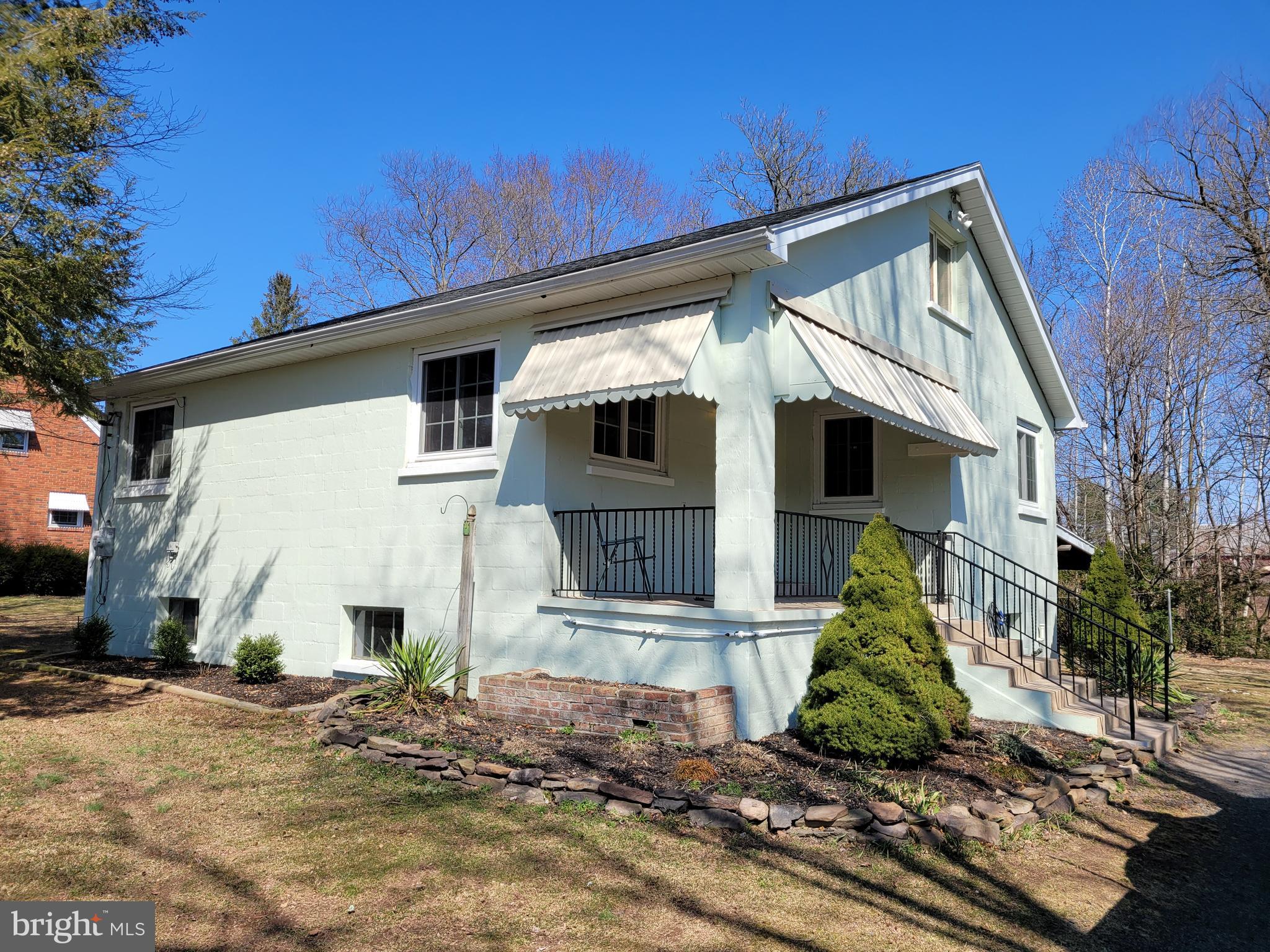 Quaint and Cozy describe this home located in North Manheim Township. Family owned and lovingly maintained for many years. Roof, Gutters, Down Spouts, Windows, Bathroom, Heat and Electric all have been updated or replaced within the past few years.  The exterior of the home was painted in 2021. The home also has a pellet stove in the basement with electric hot water heater added as a supplement heat source or is zoned so that it can be used as the primary heat source if elected. There is a full heated basement with laundry and workbench area. Additional separate room in basement could be office or a bedroom. There is an exterior exit from the basement for ease of access to the back yard. The attic is finished and offers plenty of additional storage with built in cubbies. Schuylkill County Records indicate this property is in "AE" Flood Zone however, FEMA website indicates that is "X " Flood Zone.