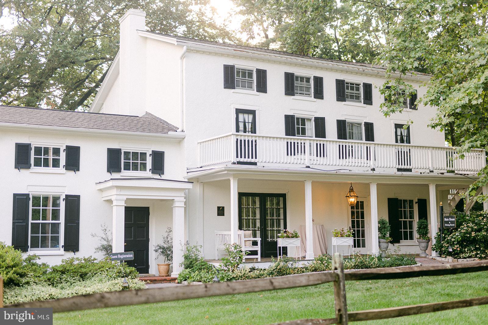 The Award Winning, iconic and highly rated Fairville Inn Bed and Breakfast is now for sale. This landmark property is located in the heart of Chadds Ford and includes the Main House dating from the early 1800s, as well as the Springhouse and Carriage House. The Main House is a contributing building in the Fairville Historic District. The owners have conducted a complete makeover of the property, transforming it into a stylish retreat and thriving business ready for the next owner. The property features a total of 10 guest rooms, each tastefully decorated. The Carriage House offers four rooms and two suites, each with a private deck overlooking the gardens. The Springhouse has four rooms, each with a deck and a panoramic view down the meadow to the neighboring pond. Eight of the rooms have gas fireplaces. The Main House features the guest reception area, a living room with a gas fireplace, an after-hours sitting room, a dining room and a commercial kitchen. There is also a commercial laundry and storage area located on the lower level of the Carriage House. The Main House also has the potential to add up to 5 more rooms, which would further drive revenue. One room has already been beautifully renovated to show the potential. Alternatively, the second level of the Main House could be easily converted into the Innkeepers residence. At present, there is parking for up to 25 cars, with further parking potential available. The parcel behind the Inn is included with the sale bringing the total acreage to 3.3 acres. Check the Village Commercial Zoning for additional revenue potential. The Inn is just minutes from world-class venues including Longwood Gardens, the Winterthur Estate and Gardens, the Brandywine River Museum, Terrain and many more in nearby Kennett Square, West Chester and Wilmington. Showings by appointment only. Listing agent must accompany all showings.