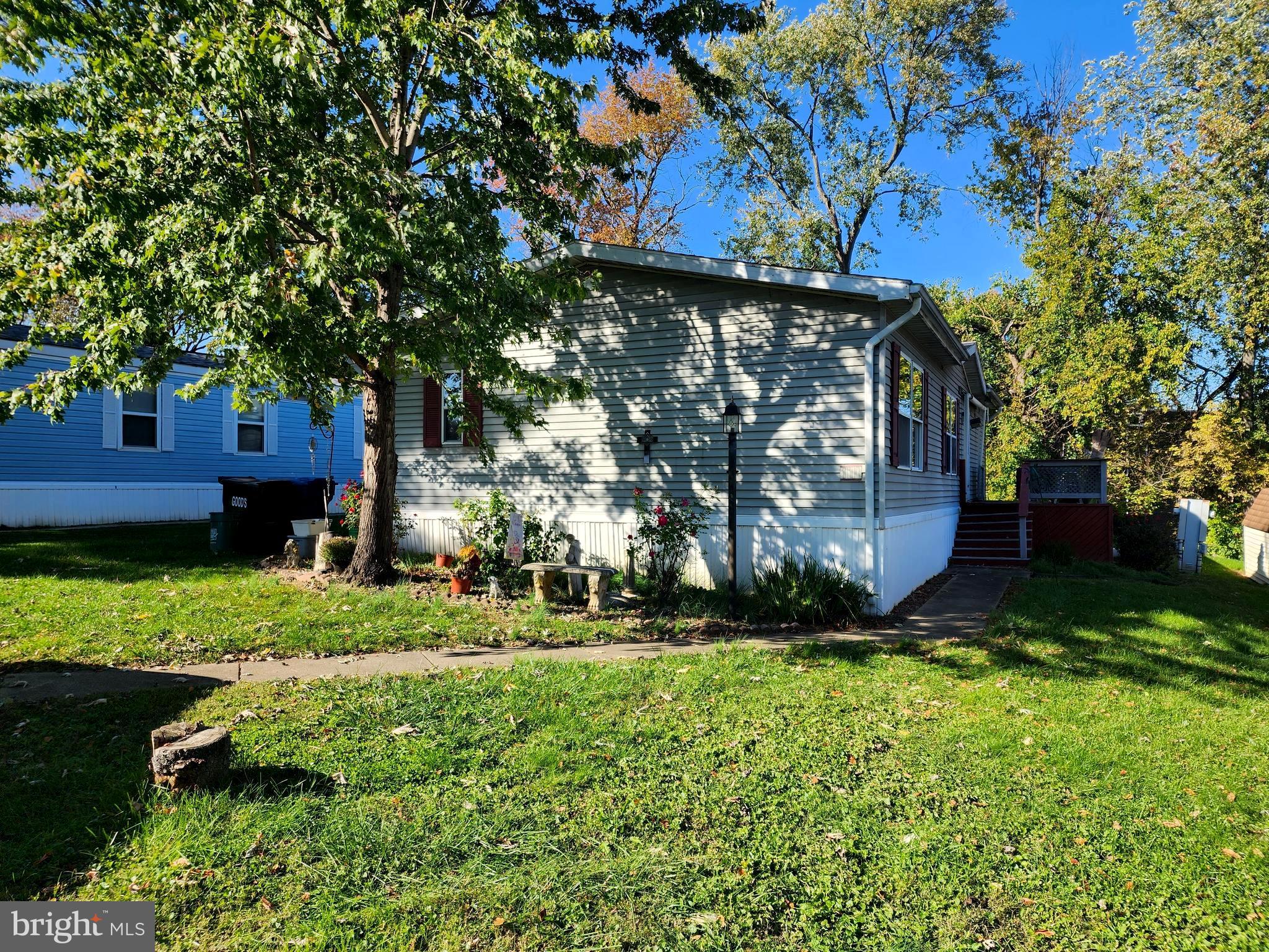 110 Fieldbridge Ct. Lancaster PA.  Double-wide mobile home in Lancaster's coveted Pheasant Ridge Community. This 2-bedroom, 2-bathroom residence boasts 1,059 sqft of living space and features vaulted ceilings, a master suite for added privacy, and included appliances such as a washer, dryer, refrigerator, and kitchen appliances. The property also comes with a convenient shed for storage. Pheasant Ridge offers a range of community amenities, including a clubhouse, fitness room, in-ground pool,  basketball courts, and more. Lot rent covers trash removal, basic cable and lawn/ snow removal of common areas. The community is pet-friendly, subject to breed restrictions. Enjoy a convenient location with easy access to major routes, restaurants, and grocery stores, as well as public transportation. With some TLC, this home has the potential to shine.  1 dog and 2 cats do live at this residence.  Don't miss out on this opportunity for comfortable living in a welcoming community.