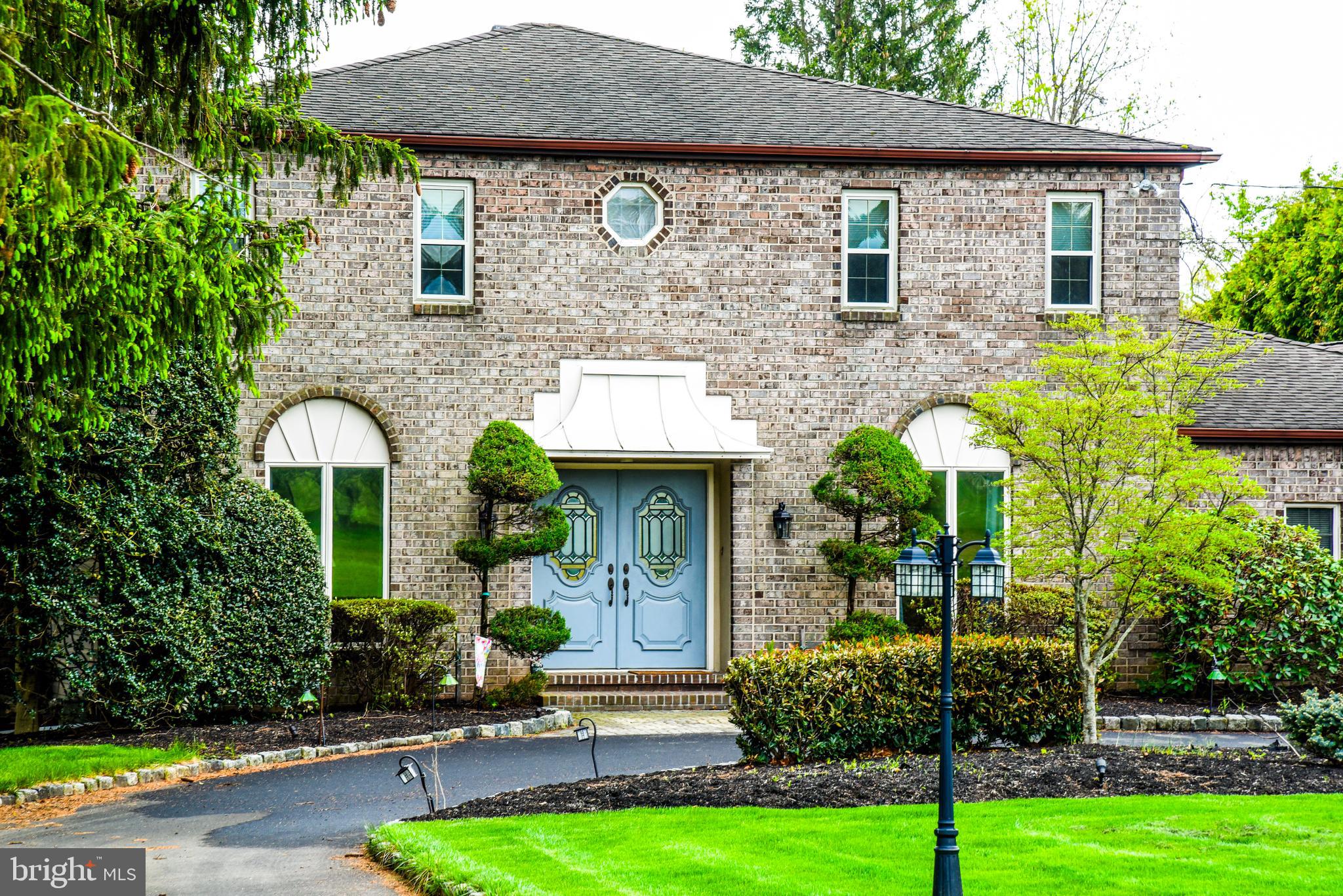 Welcome to this exceptional 4-bedroom, 2.5-bath home located in the highly sought-after Council Rock School District, offering comfort, space, and endless potential. From the moment you arrive, the circular driveway and expansive 4-car garage (2 attached, 2 detached) set the tone for both convenience and impressive curb appeal. The detached garage is further enhanced by a dedicated workshop area and an additional storage shed, making this property ideal for hobbyists, car enthusiasts, or those in need of extra space. Inside, the home unfolds with a warm and inviting layout designed for both everyday living and entertaining. The spacious eat-in kitchen serves as the heart of the home, featuring abundant cabinetry, a pantry for added storage, a stylish backsplash, stainless steel appliances, and enhanced countertop lighting. Sliding glass doors with remote-controlled curtains open seamlessly to the patio, blending indoor comfort with outdoor living. The inviting family room is filled with natural light from stunning skylights and features a cozy fireplace, ceiling fans, and direct access to the patio through sliding doors.  A built-in wet bar makes entertaining effortless, whether hosting movie nights, game days, or casual gatherings with friends and family.  Upstairs, the primary suite provides a private retreat with generous closet space and a spa-like bath featuring a jacuzzi tub, separate shower, bidet, and towel warmer. Additional bedrooms are well-sized and versatile, complemented by an updated full bath with a towel warmer.  A dedicated home office with decorative doors provides a quiet, private setting ideal for remote work or client meetings, ideally positioned just inside the main entrance for added convenience.  A conveniently located first-floor powder room is situated off the laundry area. The walk-out basement expands the home’s versatility, offering endless possibilities as a fitness area, playroom, workspace, additional food prep area, or extended storage—tailored to fit your lifestyle needs. Step outside and discover your own private oasis. The generously sized patio is partially covered and thoughtfully designed with a skylight and ceiling fan, providing a comfortable outdoor retreat even on warmer days. Whether hosting gatherings or enjoying quiet moments, the space is perfectly suited for relaxation. Complete the experience by lounging poolside or unwinding in the jacuzzi, creating a true resort-like atmosphere right at home.
A place to live beautifully, entertain effortlessly, and feel completely at home. Come see this home in person to truly experience everything it has to offer.