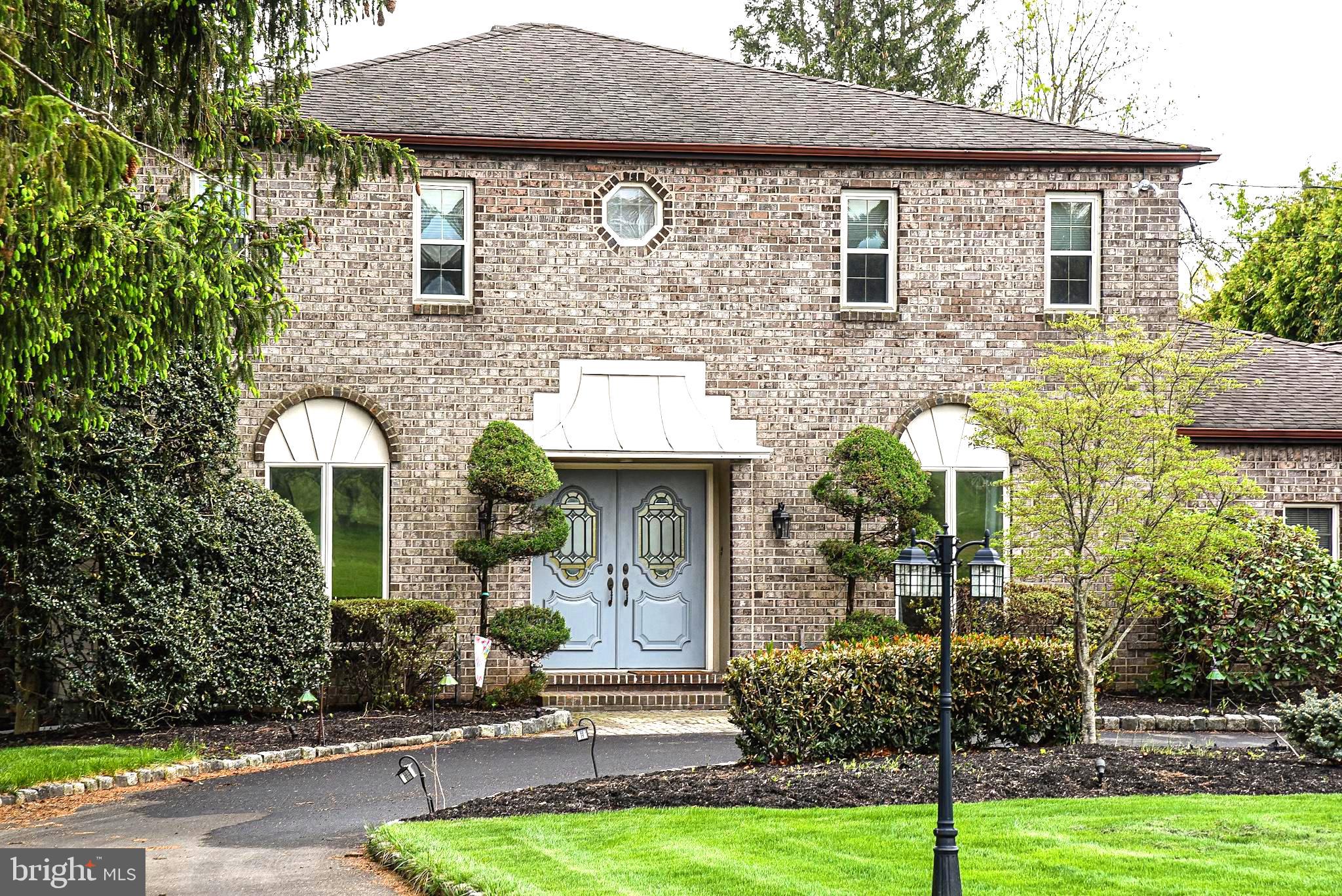 Welcome to this exceptional 4-bedroom, 2.5-bath home located in the highly sought-after Council Rock School District, offering comfort, space, and endless potential. From the moment you arrive, the circular driveway and expansive 4-car garage (2 attached, 2 detached) set the tone for both convenience and impressive curb appeal. The detached garage is further enhanced by a dedicated workshop area and an additional storage shed, making this property ideal for hobbyists, car enthusiasts, or those in need of extra space. Inside, the home unfolds with a warm and inviting layout designed for both everyday living and entertaining. The spacious eat-in kitchen serves as the heart of the home, featuring abundant cabinetry, a pantry for added storage, a stylish backsplash, stainless steel appliances, and enhanced countertop lighting. Sliding glass doors with remote-controlled curtains open seamlessly to the patio, blending indoor comfort with outdoor living. The inviting family room is filled with natural light from stunning skylights and features a cozy fireplace, ceiling fans, and direct access to the patio through sliding doors.  A built-in wet bar makes entertaining effortless, whether hosting movie nights, game days, or casual gatherings with friends and family.  Upstairs, the primary suite provides a private retreat with generous closet space and a spa-like bath featuring a jacuzzi tub, separate shower, bidet, and towel warmer. Additional bedrooms are well-sized and versatile, complemented by an updated full bath with a towel warmer.  A dedicated home office with decorative doors provides a quiet, private setting ideal for remote work or client meetings, ideally positioned just inside the main entrance for added convenience.  A conveniently located first-floor powder room is situated off the laundry area. The walk-out basement expands the home’s versatility, offering endless possibilities as a fitness area, playroom, workspace, additional food prep area, or extended storage—tailored to fit your lifestyle needs. Step outside and discover your own private oasis. The generously sized patio is partially covered and thoughtfully designed with a skylight and ceiling fan, providing a comfortable outdoor retreat even on warmer days. Whether hosting gatherings or enjoying quiet moments, the space is perfectly suited for relaxation. Complete the experience by lounging poolside or unwinding in the jacuzzi, creating a true resort-like atmosphere right at home.
A place to live beautifully, entertain effortlessly, and feel completely at home. Come see this home in person to truly experience everything it has to offer.