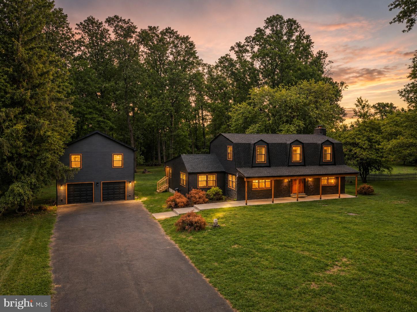 Welcome to a truly exceptional fully reimagined estate in the heart of Bucks County, where timeless craftsmanship meets modern luxury on 1.5 private acres within the highly sought-after Council Rock School District. Taken completely down to the studs and rebuilt to C2 “new construction” standards, this stunning property offers 3,099 square feet of beautifully finished above-ground living space, plus an additional 378-square-foot unfinished basement ready for storage, a gym, or future expansion. The detached dwelling features a 2-car garage plus a 642 square foot finished loft above, fully insulated and featuring central HVAC. Designed with both elegance and functionality in mind, the main residence features 5 spacious bedrooms and 3.5 designer bathrooms, complemented by an expansive open-concept layout ideal for modern living and entertaining. Every detail has been thoughtfully curated, from the real cedar wood accents throughout to the imported marble tile from Spain, creating a warm yet sophisticated aesthetic. The chef’s kitchen, featuring a 36-inch-range stove, microwave drawer, wine cooler and ice maker, flows seamlessly into the main living and dining areas, anchored by a charming working fireplace and filled with natural light from all-new windows. A dedicated laundry room with custom cabinetry adds everyday convenience, while dual-zoned HVAC ensures comfort throughout the home year-round. No expense was spared in the complete transformation of this property, including all-new framing, plumbing, electrical, drywall, roofing, siding, sheeting, 2-zoned HVAC systems, kitchens, and bathrooms. The home is also prewired for alarm and security camera systems for added peace of mind. Ideally located just 5 minutes from the shops and restaurants of Newtown’s State Street, moments from Tyler State Park, and less than 10 minutes to I-95, this one-of-a-kind property offers the perfect blend of luxury, privacy, and convenience. A rare opportunity to own essentially brand-new construction in one of Bucks County’s most desirable locations. *Some listing photos have been virtually staged*