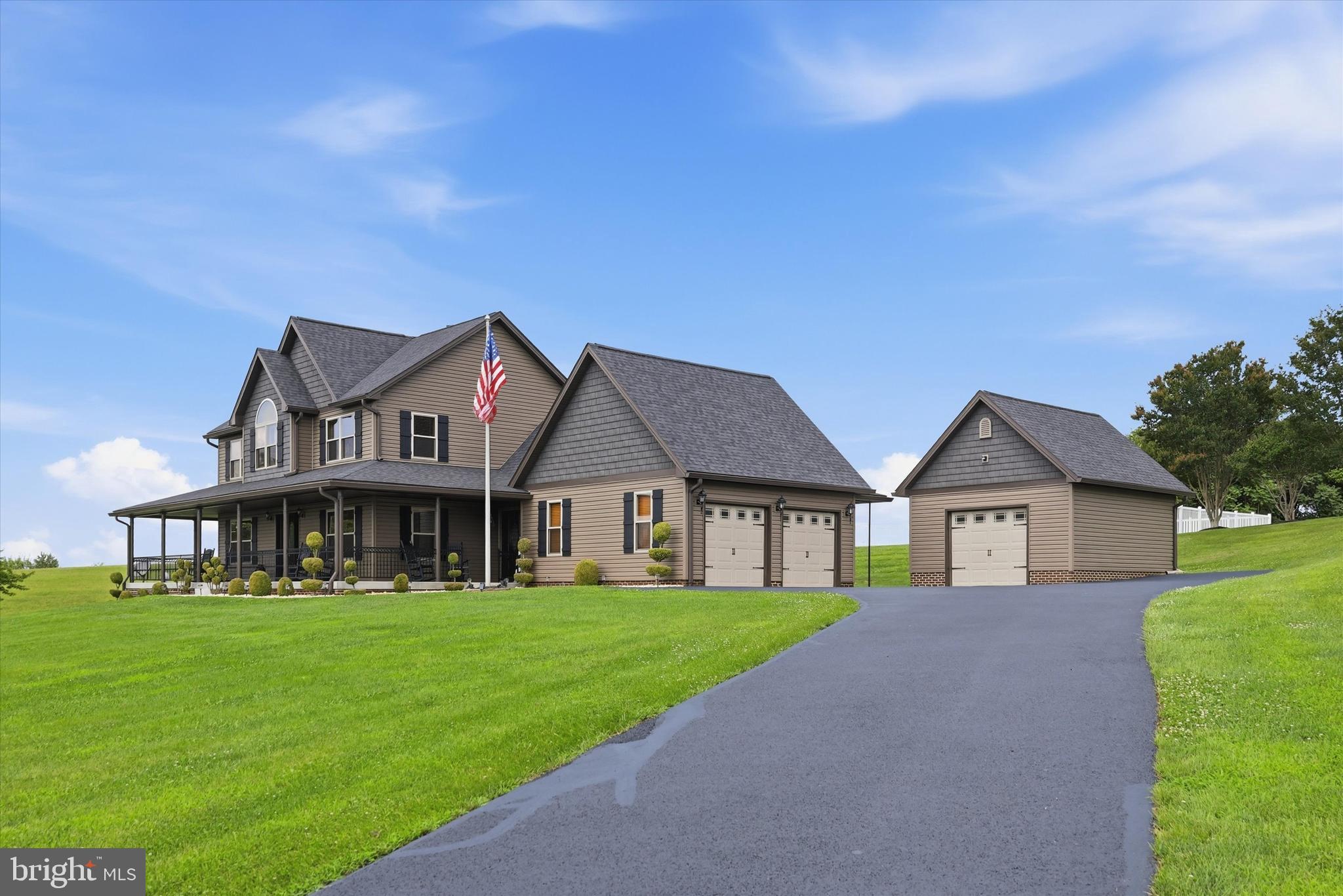 ***OPEN HOUSE*** Saturday, July 25th from 1-3pm ***OPEN HOUSE*** Beautifully maintained 3-bedroom, 2 full and 2 half bath home situated on 1.67 scenic acres, offering panoramic views and exceptional indoor and outdoor living spaces. The main level features gorgeous hardwood flooring, complemented by fresh interior paint, and includes a formal living room, formal dining room, spacious eat-in kitchen, inviting family room with a gas fireplace, and the convenience of a main-level laundry room. Hardwood flooring continues throughout the upper level, creating a warm and timeless feel. Upstairs, you'll find three generously sized bedrooms, including a comfortable primary suite. The fully finished walk-up basement offers additional living space, perfect for a recreation room, home office, gym, or media area. Step outside to your own private backyard retreat featuring a slate patio, fenced in-ground pool surrounded by low-maintenance vinyl fencing and spectacular countryside views. Relax on the inviting three-quarter wraparound front porch or entertain family and friends while enjoying the peaceful setting. Car enthusiasts, hobbyists, or those needing extra storage will appreciate the attached two-car garage in addition to the detached one-car garage. Ideally located in Jefferson, this exceptional property combines beautiful finishes, spacious living areas, and an outstanding setting to create a place you'll be proud to call home. Don't miss your opportunity to own this remarkable property!
