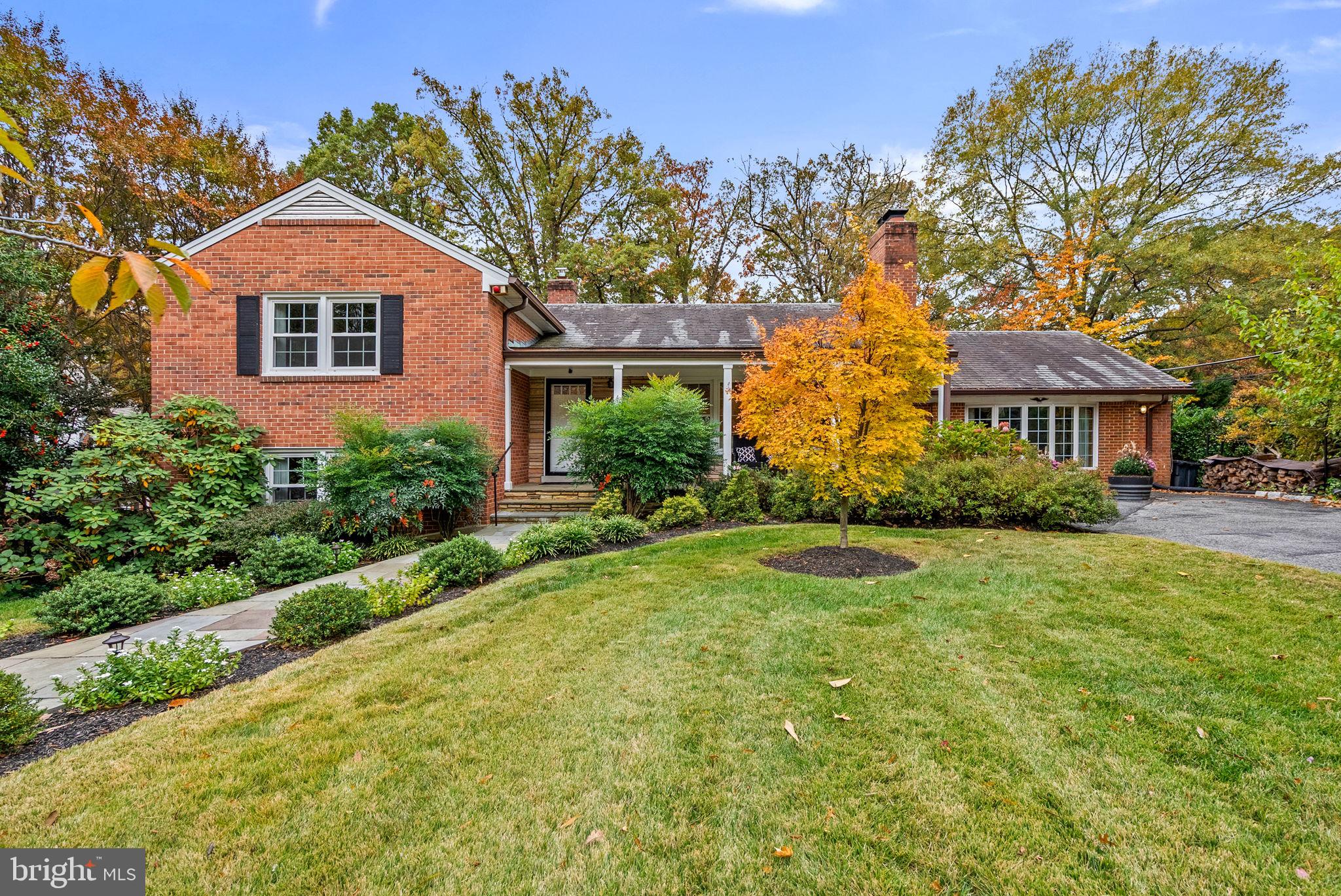 A rare opportunity to own two houses in one!  Set up as a fully separate but attached in-law suite, this tastefully renovated and expanded brick split-level home showcases a contemporary feel that is both inviting and functional, making it an excellent choice for modern living. Want to avoid a lengthy, intrusive and costly renovation/expansion, you must see this home! As you step inside, you are greeted by an abundance of natural light that floods the spacious living room, highlighting the cozy fireplace that serves as a perfect gathering spot for friends and family. The modern kitchen, equipped with sleek finishes and a stylish breakfast bar, flows seamlessly into the elegant separate dining room, creating an atmosphere that is ideal for entertaining loved ones or hosting special occasions.

 On the upper level, the primary bedroom serves as a serene retreat, complete with an ensuite bathroom that adds a touch of luxury to your daily routine. Three additional bedrooms and another full bath provide ample accommodations, perfect for family members, guests, or even a home office. On the lower level, the inviting family room, complete with its own fireplace and wet bar, offers an excellent area for relaxation and leisure activities. Additionally, a carefully arranged laundry area and a full bathroom enhance the home's practical features, ensuring that day-to-day tasks are managed with ease.

A thoughtfully designed two-story addition enhances the overall space, featuring a second kitchen, a welcoming family room, and two comfortable bedrooms, each paired with its own full bathroom. This well-considered layout ensures that every family member enjoys both the privacy they desire and the convenience of easy access to shared spaces.   This is the true definition  of a dedicated in-law suite.

The rear patio beckons you to enjoy the refreshing outdoor air, surrounded by a beautifully manicured lawn that is perfect for outdoor gatherings. A handy storage shed is conveniently positioned in the garden, offering a practical solution for maintaining the lovely outdoor space and keeping gardening tools organized. This home truly presents a harmonious blend of comfort, style, and functionality, making it a wonderful place to create lasting memories.