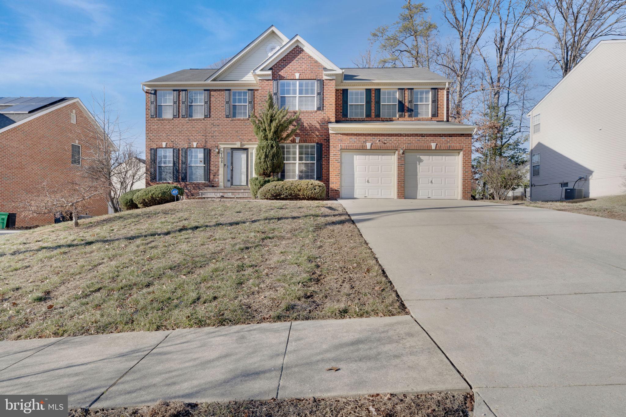 Motivated seller, bring offers. VA assumable 3% loan!  Location! Location! Location! In the sought-after Tantallon North Subdivision, walking distance from the brand new Colin L. Powell elementary school,  close to  I-95, National Harbor, Tanger Outlet, and Old Town Alexandria.  Move-In-Ready, stunning brick front colonial with a cobblestone walkway, three finished levels with two-level 6-foot extension, two-car garage home features a whole house built-in sprinkler system, digital security system, gas fireplace, walk-up basement with full bath and movie room with gym, den, rec room, storage room, formal living, and dining room, eat-in kitchen with gas cooking, recessed lighting, Corian countertops, stainless steel appliances, large kitchen island, hardwood floors, spacious bumped-out family room, study, dual staircase, high ceilings, Stunning crown moldings, floor to ceiling windows, lots of natural light, custom blinds, oversized master suite with sitting area and substantial wrap-around walk-in closet,  secondary bedrooms also have walk-in-closets, laundry room on the upper level,  two-story foyer, brick patio, tranquil backyard, dual zone HVAC ample parking on the driveway and so much more. The seller prefers Kensington Vanguard as the title company.