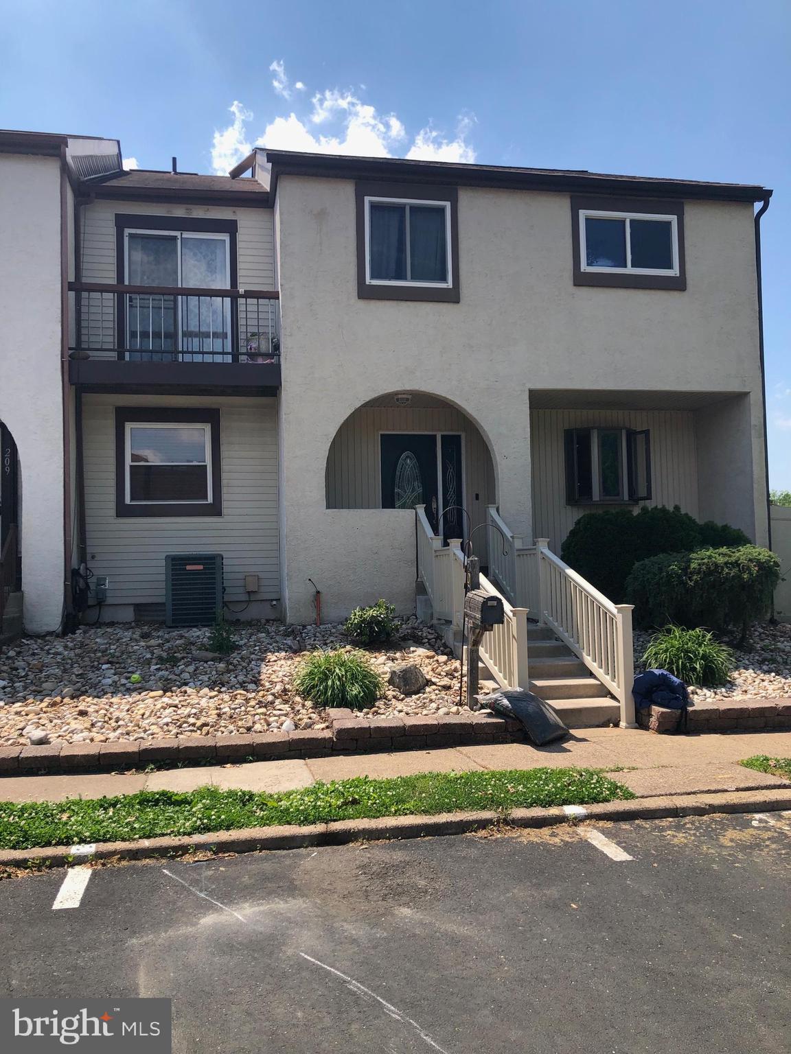 Move in ready end unit with fenced yard and large rear deck and wide open common area space next to unit. Parking in front of unit. Entry foyer with tile floor, wainscotting and stone tile wall.  2nd floor washer and dryer and pull down stairs to attic.  3 1/2 updated bathrooms with main bath walk in shower.  Updated kitchen with granite countertops, custom backsplash and breakfast bar.  Living room with  wall to wall carpet, wood burning fireplace with stone surround, chair rail and sliding glass doors to deck.  , finished basement with 3 rooms (2 rooms currently used as undedicated bedrooms) and full bath. 2nd floor private deck with sliding glass doors off main bedroom.  New front steps with railing, pet friendly development.  2 year old roof.
Premium location at end of dead end street with no through traffic and great for safety of children with lots of play area next to unit on open space common area.  Quick settlement available.
Seller will give $8000 credit for new central air.