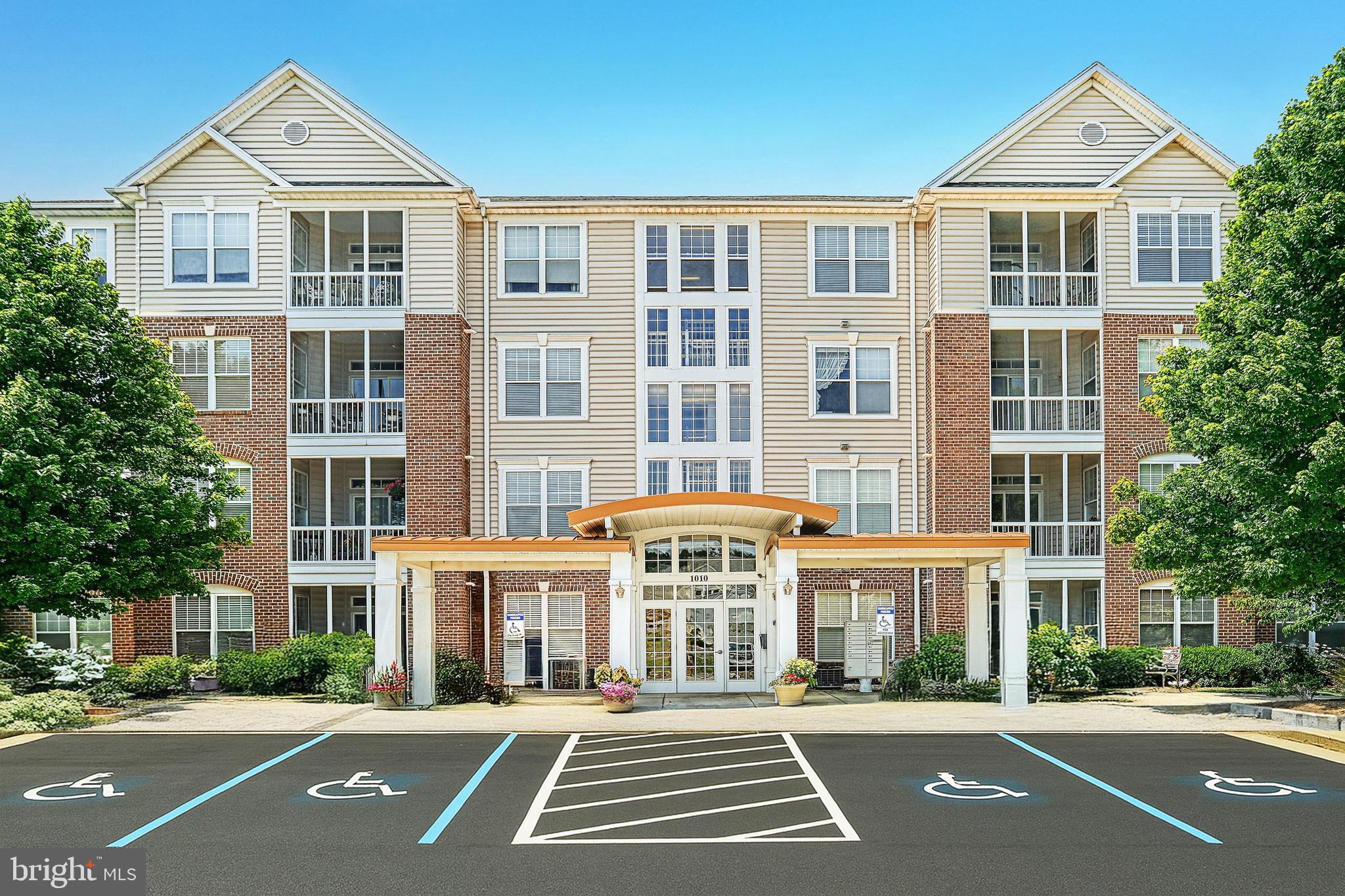 Welcome to Greenleigh 1010 Condominiums, a 55+ community within Regent's Glen!  This top floor move-in ready condo offers views of the nearby York County Rail Trail. Featuring 9' ceilings with 2 bedrooms and 2 full bathrooms, this home has been tastefully updated with new flooring throughout and new vanities in both bathrooms. The open floorplan provides plenty of space for relaxation or entertaining with a bright eat-in kitchen. There is also a private balcony off the dining area.  The HVAC was replaced in 2020. Optional Regent's Glen membership offers many amenities, with a Golf Course, Driving Range, Fitness Center, Outdoor Swimming Pool and more!