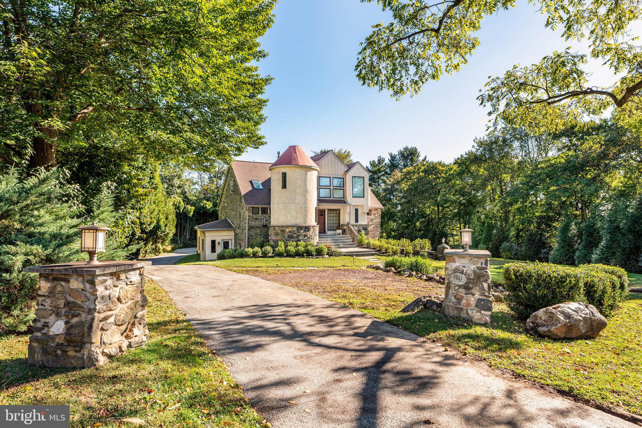 Historic Character Meets Modern Luxury in Lower Merion Township

Welcome to 1311 Hagys Ford Road, an extraordinary residence where 18th-century charm and 21st-century comfort come together seamlessly. Originally constructed in the 1790s as a working barn, this remarkable property was expertly converted into a private residence in the 1990s, creating a truly one-of-a-kind home in the heart of Penn Valley.

Set on 1.6 acres of beautifully landscaped grounds, this 6-bedroom, 4 full bath, and 2 half bath estate offers more than 7,600 square feet of finely finished living space. Every inch of the home reflects thoughtful updates and meticulous maintenance, preserving its rustic origins while incorporating modern amenities for today’s lifestyle.

Step inside to find soaring ceilings with exposed stonework, rich woodwork, and expansive living and entertaining areas that blend warmth and sophistication. The updated bathrooms, newer roof on the attached garage, and recently upgraded HVAC systems and dual tankless water heaters ensure comfort and efficiency throughout the year.

Perfect for both family living and large-scale entertaining, this home offers a flexible floor plan with multiple living spaces, a spacious kitchen, and inviting bedrooms that provide comfort and privacy for family and guests alike.

Outside, enjoy the serene surroundings and the timeless appeal of the property’s historic stonework and mature landscaping. A true private retreat just minutes from top-rated Lower Merion schools, Center City Philadelphia, and all Main Line conveniences.