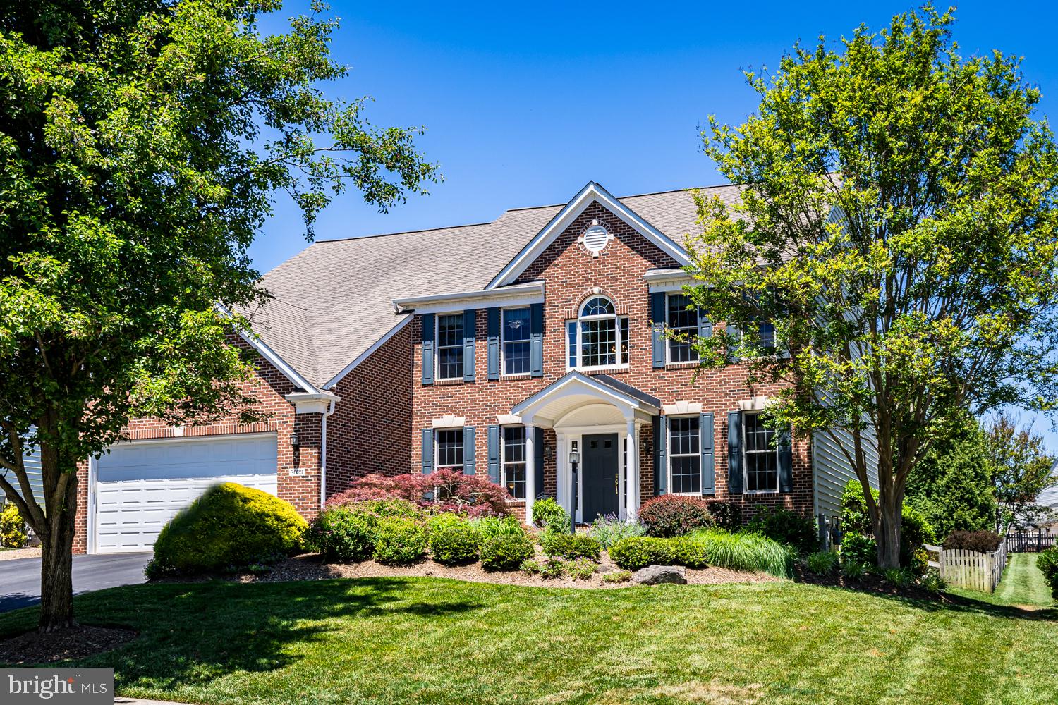 This feature rich luxurious home in the sought-after Carlee Manor section of the Turf Valley neighborhood will exceed your expectations. After entering through the two-story grand foyer your family and friends can spread out and enjoy its well over four thousand square feet of thoughtfully designed living space and top of the line finishes. Rich hardwood floors and elegant moldings distinctively warm the main level. The expanded gourmet kitchen is an absolute chefs dream with its gas cooktop, two full sized wall ovens and two dishwashers, center island, stone countertops and loads of extra cabinetry all wide open to the adjacent family room with a warm, cozy gas fireplace and mantel. There is a breakfast area to enjoy as well as a separate elegant, formal dining room. A strategically located expansive office finishes off the main level. Upstairs in the primary suite the walk in closet cold be its own room for scale. The ensuite luxury bath boasts a jetted tub, separate glass shower and a private water closet. Four more spacious bedrooms surround the open upper landing with one with attached bath and a center hall full bath with double vanity. The lower level has a second family room to enjoy with a walk-up exit to the patio and yard as well as a third full bath. There is also a media room on this level with built in surround sound wall /ceiling speakers and game closet big enough to hold all. Stepping outside from here you can entertain or relax (outdoor speaker) on the beautiful multilevel flagstone patio which blends right into nature overlooking the level one third acre lot with its underground irrigation system backing to trees. The oversized two car garage is equipped with EV charging stations and there is ample driveway parking space available. All this on a peaceful cul-de-sac tucked away in a desirable neighborhood in Howard County with some land to boot! Just moments away from the Turf Valley Country Club and Golf Course, upscale grocery stores and fine dining and the Patapsco State Park as well as many other local amenities and attractions including the historic Downtown Ellicott City. It’s only about 20 minutes to Baltimore Washington International Airport from here yet a reasonable commute to Washington DC via several major routes nearby. This home will not disappoint.