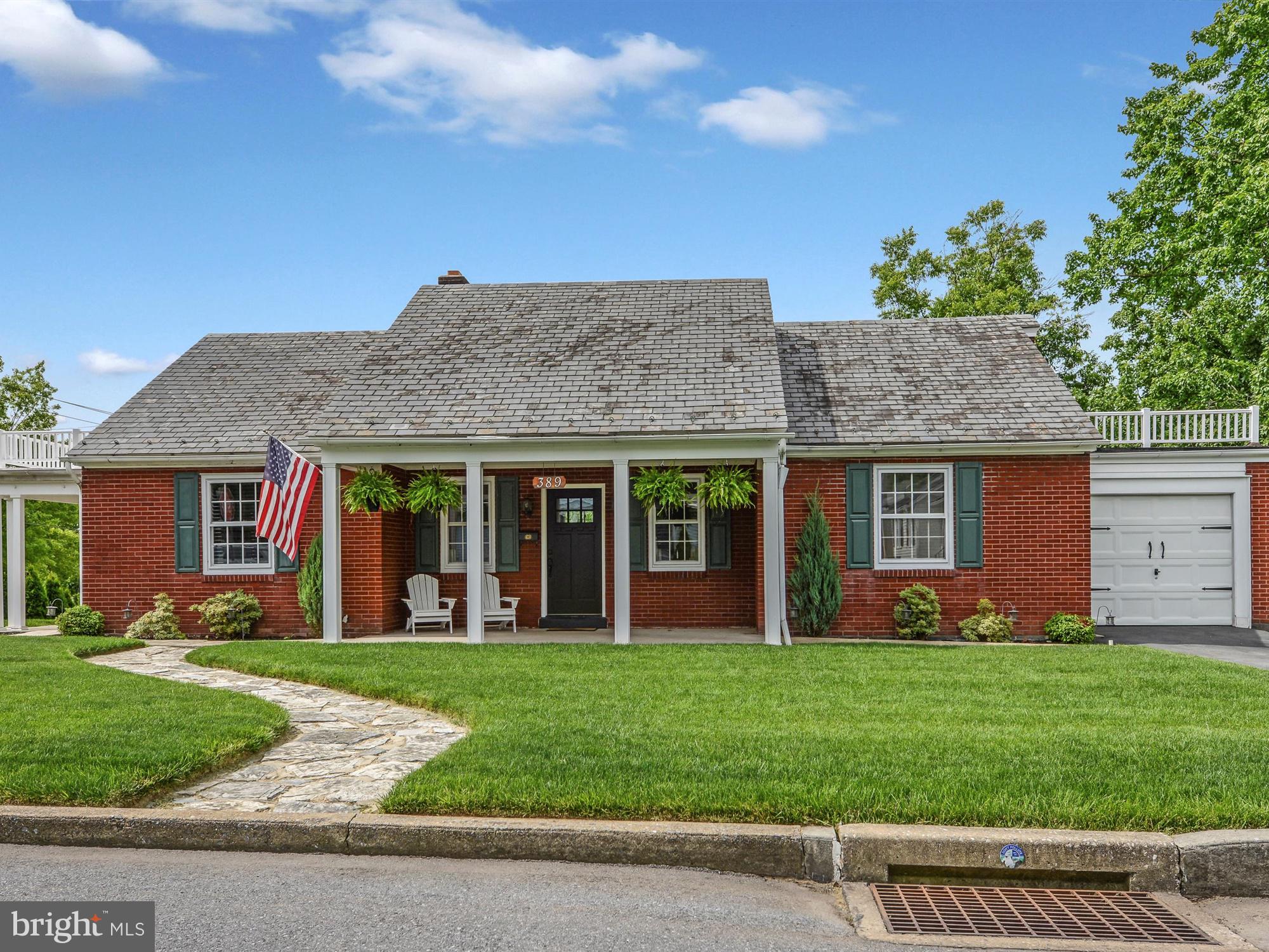 Absolutely stunning from top to bottom! Do not miss your opportunity to see this beautifully updated 2 bedroom home. From the moment you pull up you will be amazed by everything this home has to offer. The new front door opens to a large, light-filled, living room with new carpet and an inviting stone fireplace. Enjoy the spacious dining room featuring hardwood floors, refinished woodwork and a beautiful accent ceiling. In the kitchen you will find updated appliances. The bathroom has been completely renovated with stunning tile floors, a soaking tub and a rainfall shower head. The bedrooms are spacious and both feature refinished hardwood floors. The bonus room on the second floor opens to a large balcony. The side patio and large backyard are the perfect place to enjoy summer evenings. A large, clean, walkout basement provides room for storage and a workspace. See the associated documents for a full list of the updates and improvements done to the home. Schedule your showing today!