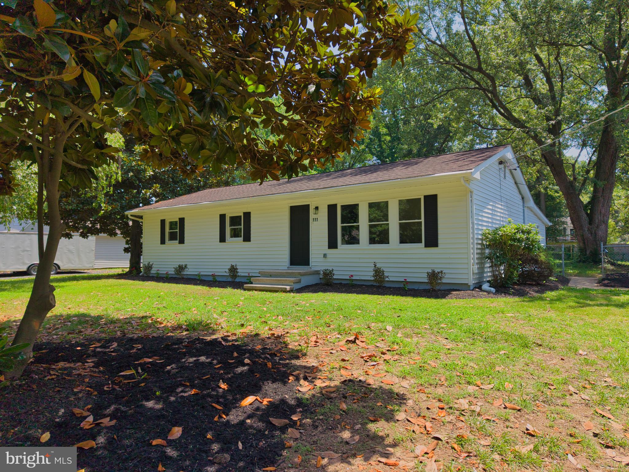 Seller is offering 2% CLOSING HELP to get you on your way with less out of pocket cost! 
Welcome to your dream coastal retreat on Kent Island! This completely updated 4-bedroom, 2-full-bath rambler sits on a sprawling, tree-lined half-acre lot, offering the perfect blend of modern luxury and active outdoor living. A large, detached garage adds exceptional storage space for your vehicles, golf cart, and coastal gear. Step inside to find a light-filled layout highlighted by a spectacular gourmet chef’s kitchen. Outfitted with stainless steel appliances, a deep stainless sink with a high-arc faucet, and a sleek 4-burner gas stove with a center griddle, this kitchen is a home chef's paradise.The single-story floor plan features four generous bedrooms and two beautifully updated full baths, maximizing comfort and convenience. The primary bedroom has been expanded and the gorgeous primary bath has a high quality, walk-in shower and distinctive, touch of class vanity.  Outside, your private half-acre oasis connects seamlessly to the local lifestyle. Enjoy immediate access to the tree-lined walking, biking, and golf cart paths leading directly to the neighboring Blue Heron golf course and driving range. Best of all, you are just 5 miles away from sandy days at Matapeake Beach and sunset fishing at the pier. Don't miss this rare Kent Island gem!
