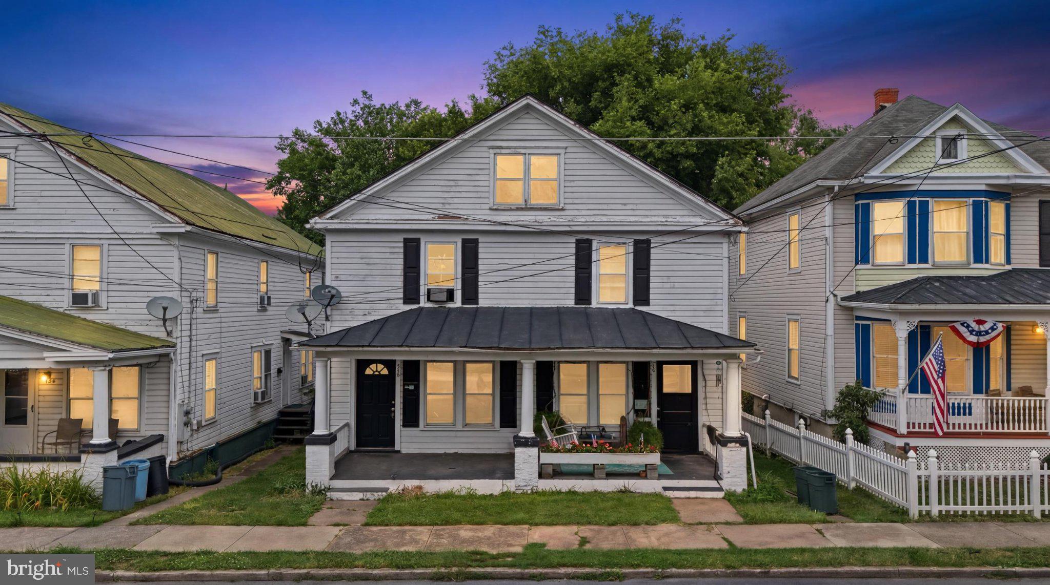 This charming Colonial twin home, built in 1920 and effectively improved in 2022, making it an attractive investment opportunity. With each unit featuring a 3 bedrooms and 1.5 baths, the 2,460 sq. ft. Interior highlights include hardwood and vinyl flooring, an attic for additional storage, and convenient in-unit laundry facilities. The property is equipped with essential appliances, including an electric oven/range, refrigerator, and water heater, ensuring a hassle-free transition for tenants or future owners. The exterior boasts a low-maintenance vinyl siding, a welcoming porch, and a patio area, ideal for outdoor relaxation. The lot, measuring 0.08 acres, features sidewalks and street lights, enhancing the neighborhood's appeal. Enjoy city views from the property, adding to its charm. With no HOA fees and on-street parking available, this property presents a low-cost entry point for investors. The average condition of the home, combined with its recent renovations, positions it well for rental income, live one side and rent the secon half of the duplex. This property is a prime candidate for those looking to capitalize on the growing demand for residential rentals in urban areas.