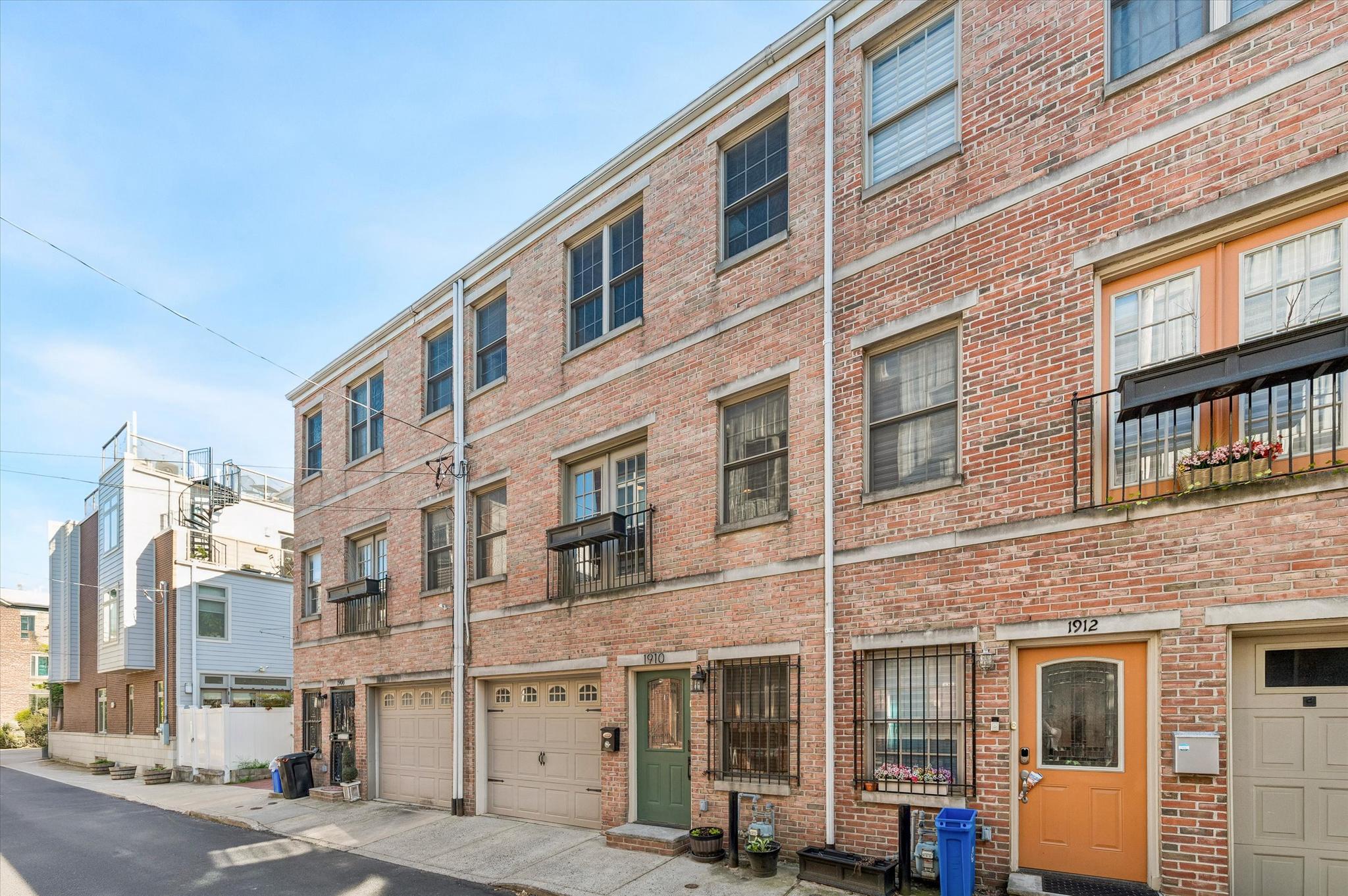 Welcome to 1910 Webster St, a beautifully-updated, 20' WIDE townhome with GARAGE PARKING, located on a quiet, low-traffic block in the award-winning Marian Anderson Neighborhood Academy catchment (walk less than 1 block to school!) and in the heart of Graduate Hospital. This spacious home seamlessly blends modern upgrades with thoughtful design, all within walking distance to Rittenhouse Square and the best dining, shopping, and amenities in Philadelphia.

• Step inside to find a convenient first-floor bedroom with an en-suite bathroom (perfect for a guest suite or office), a garage sizable enough for the owner's SUV, and a back patio.  The main living area features a light-filled interior with Double-Wide living and kitchen area—perfect for  everyday living + entertaining. The home’s impressive width allows for a more open, comfortable layout rarely found in the neighborhood, PLUS dual French doors on either side of this room for a lovely cross-breeze! The updated kitchen features a breakfast bar, upgraded quartz countertops, and ample storage.  
• Take in stunning, unobstructed Center City skyline views from your private ROOF DECK—a spacious and tranquil setting ideal for relaxing or hosting guests.

• Situated on a premier, quiet block in Graduate Hospital, this home offers the perfect combination of space, style, and walkability-- just a stone's throw from top-rated restaurants & cafés, such as Sidecar Bar, Loco Pez, and Ultimo Coffee. Plus a very easy commute to CHOP & HUP! Don’t miss this exceptional opportunity to own a standout property in one of Philadelphia’s most sought-after neighborhoods.