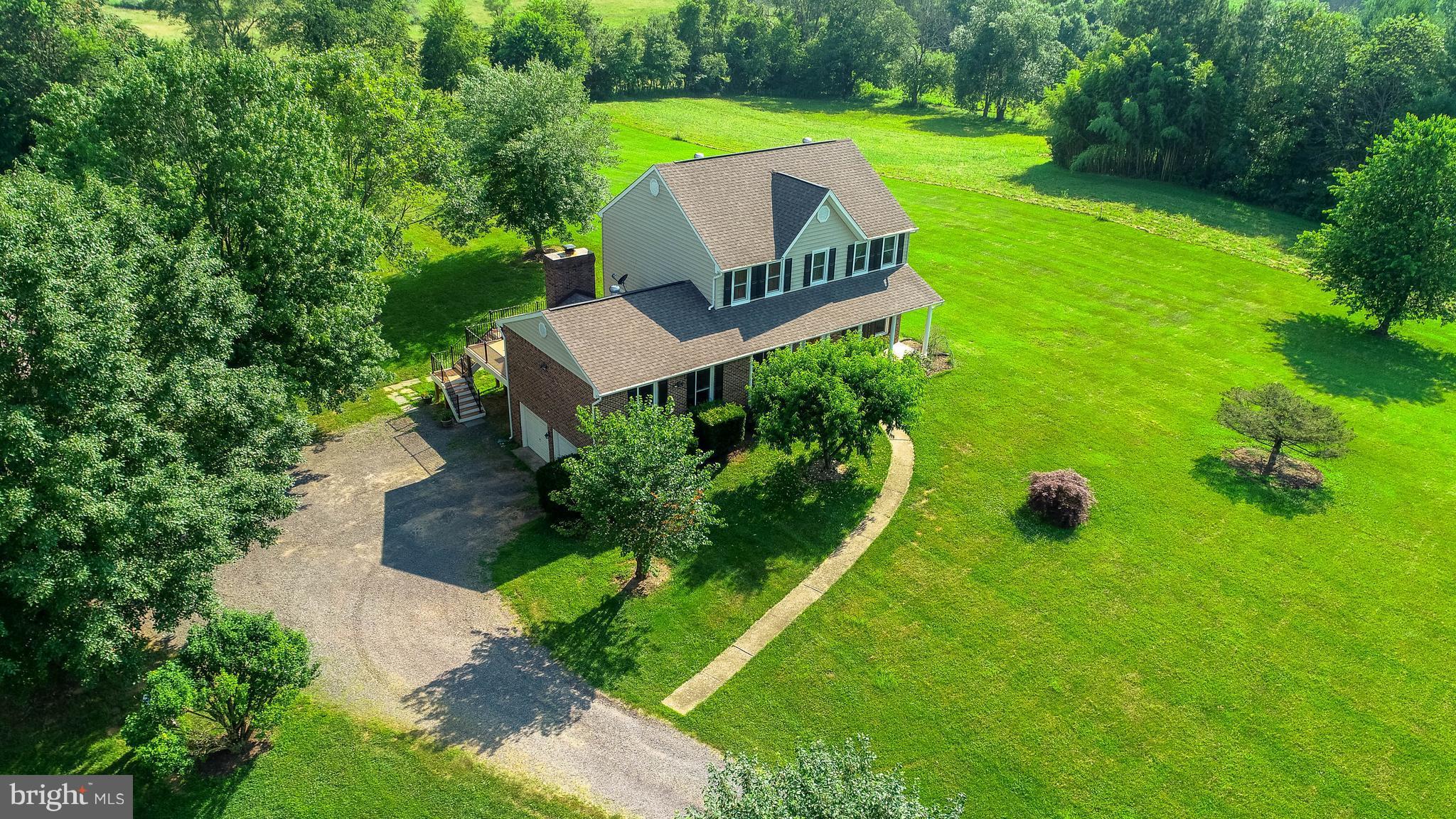 A RECIPE FOR RELAXATION The living is easy in this impressive, generously proportioned colonial! Boundless outdoor space in the backyard offers enough breathing space for the biggest family gathering. So much to love about this home, newer roof, 17x21 trex deck, remodeled baths, basement kitchenette, 2 car attached garage, 2 car detached shop. Walkout basement & room w/ egress for another bedroom.
