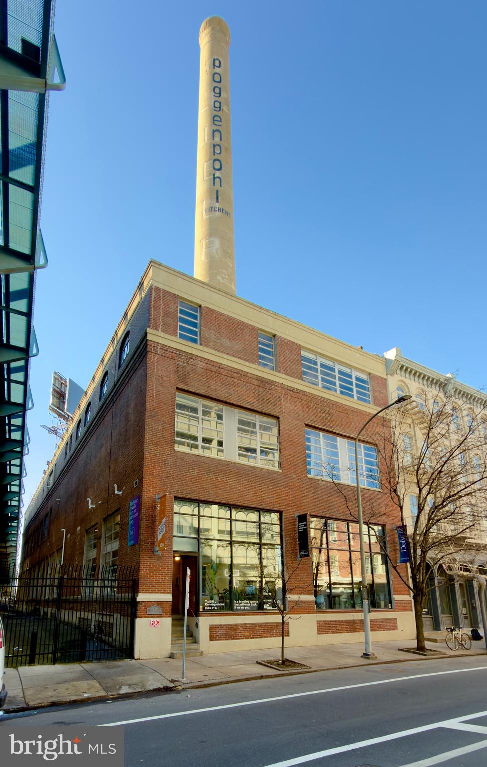 230 N 2nd Street, the former power plant to the Wilbur Chocolate Factory, presents a rare opportunity to acquire a character-rich, multi-tenant creative office asset in the heart of Old City, Philadelphia. This 28,470 SF historic brick building blends authentic loft-style architecture with institutional grade upgrades, currently accommodating a diverse mix of creative offices, production studios, and event space. The property features high ceilings, open floor plates, and flexible layouts, allowing for a wide range of configurations suited for office, studio, event, retail, hospitality, or hybrid uses under CMX-3 zoning. Over nearly three decades of ownership, the asset has undergone significant capital improvements, including 15 HVAC systems, separate utilities, upgraded life-safety systems, and a restored 200-foot iconic smokestack offering exceptional branding visibility with potential ancillary signage income. Strategically located just north of Market Street with proximity to major landmarks and transit corridors, the property benefits from strong tenant demand and foot traffic in one of Philadelphia’s most historic and vibrant neighborhoods. The asset is well-suited for a variety of uses, including a single tenant headquarters or a multiple tenant commercial building. An investor can capitalize on the property’s existing improvements and Old City address while pursuing future upside through strategic lease-up, reconfiguration of interior spaces, and capturing market-rate rents over time.
Character Rich, Loft Style Improvements: The building’s distinctive architecture, generous ceiling heights, and flexible floor plates create an ideal environment for creative users, production companies, boutique office tenants, and experiential concepts seeking a “non-commodity” space that reflects their brand.
Flexible User or Investor Opportunity: 230 N 2nd Street can accommodate a wide range of business plans:
Owner User Headquarters: Establish a flagship presence in Old City with branded space (full smokestack signage available) in a building you control.
Multi Tenant Investment: Reconfigure and lease to multiple tenants to diversify income and maximize rent per square foot.
Hybrid Strategy: Maintain a portion for owner occupancy while deriving income from third-party tenants.
Long Term Urban Infill Asset: With limited development sites remaining in Old City, well-located existing buildings like 230 N 2nd Street are poised to benefit from continued neighborhood maturation, rent growth, and the ongoing appeal of authentic brick-and-beam product in a historic setting.
Establish a Signature Headquarters in the Heart of Old City: The Power Plant presents a rare opportunity for an owner-user to establish a signature headquarters while implementing a flexible hybrid strategy - occupy primary floors, monetize additional suites to offset carrying costs, and leverage smokestack branding to elevate company presence.
Control Your Space (Build Long Term Equity): Opportunity to occupy a portion or the entirety of the building while benefiting from long-term real estate appreciation
Brand Visibility & Identity: Iconic smokestack, with over 100,000 views per day, offers skyline branding and signage space rarely available to owner-users in Philadelphia. Industrial architecture and loft style design create a memorable headquarters environment.
Functional Infrastructure for Modern Users: Large open floor plans accommodate collaborative workspace, studio production, showroom, or event-driven layouts. Building “wide open” end to end (no load bearing walls) allows for multiple configurations and partitioning of spaces to accommodate any end user as well as future growth.