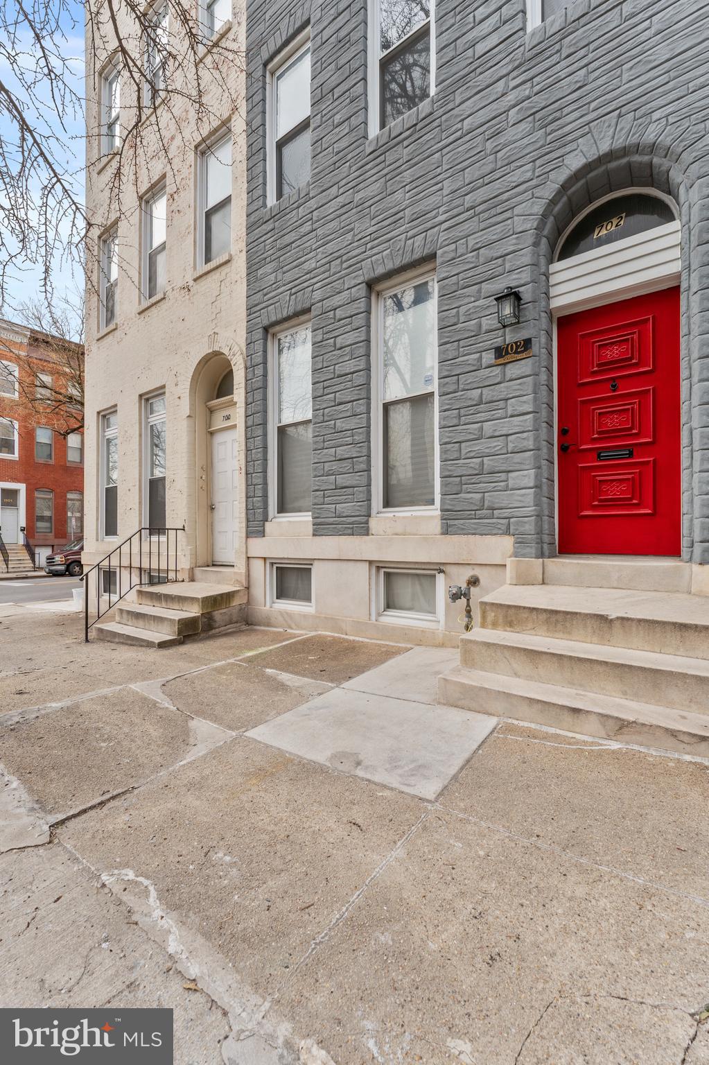 ***Up to $10,000 in seller concession to the buyer with an accepted offer!***

Step inside the newly transformed 702 N Arlington Ave, a stunning 5-bedroom, 3.5-bathroom row home in the heart of Baltimore. With a Baltimore City-approved Use & Occupancy certificate and eligibility for $10k in first-time homebuyer grants (plus other incentives for qualified buyers), this property is the perfect blend of modern style, historic charm, and unbeatable opportunity.

This three-story gem has been meticulously updated from top to bottom. You’ll love the modern, gleaming vinyl floors, intricate crown molding, curved staircase, art deco fireplace, and exposed brick accents that add character and warmth. Recent upgrades include a new roof with coating, a new water heater, brand-new mechanical systems, and all-new appliances featuring a refrigerator with ice and water system. Zoned for multi-family use, this home offers incredible flexibility—whether you’re planning for Airbnb, multi-generational living, or something entirely unique.

The main level features an open and airy living room with tall ceilings and windows, which flows seamlessly into the formal dining room with its charming brick wall. The chef’s kitchen has been completely reimagined with luxe countertops, sleek modern cabinetry, and stainless steel appliances. A conveniently placed laundry room rounds out the first floor.

On the second level, you’ll find a spacious primary suite with an en suite bath and room for a cozy sitting area, plus two additional bedrooms and a full bathroom. Head up to the third floor, where another oversized bedroom—also with space for a sitting area—awaits, along with an additional bedroom and full bath. The basement offers plenty of storage, and the newly poured concrete pad out back is perfect for barbecuing or outdoor entertaining.

Situated midway between Druid Hill Park and the Inner Harbor, this home puts you at the center of everything Baltimore has to offer. Enjoy a short commute to UMBC or Johns Hopkins, and explore the vibrant local scene with restaurants, shopping, and attractions just steps away. This is city living at its finest—don’t miss your chance to call 702 N Arlington Ave home!