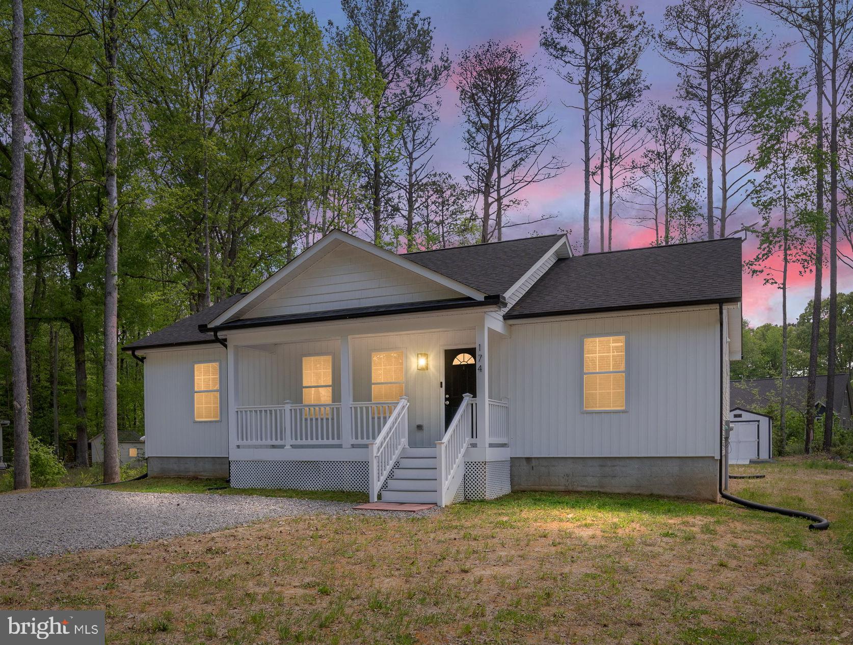 Welcome Home to Placid Bay!** Experience this beautifully designed, recently built home in Placid Bay Estates that perfectly balances comfort and functionality. As you enter, the striking cathedral ceiling and exquisite finishes create an inviting atmosphere.

The charming board and batten siding sets a welcoming tone, and you can unwind on the front porch or entertain on the spacious back deck. High-end Luxury Vinyl Plank (LVP) flooring adds both style and durability throughout.
The chef's kitchen is a standout feature, featuring custom 42” cabinetry, gorgeous granite countertops, and top-of-the-line stainless steel appliances. Luxurious bathrooms showcase custom tile work and elegant quartz countertops, complemented by recessed lighting and upgraded fixtures.

Additional highlights include a walk-in closet in the primary bedroom, a walk-in pantry, and an expansive backyard with a wide driveway. 
Enjoy quick access to local attractions:
- 15 minutes to Colonial Beach
- 20 minutes to Dahlgren and Montross
- 40 minutes to Fredericksburg and Tappahannock 

Don’t miss your chance to see this exceptional property—it's a must-see!