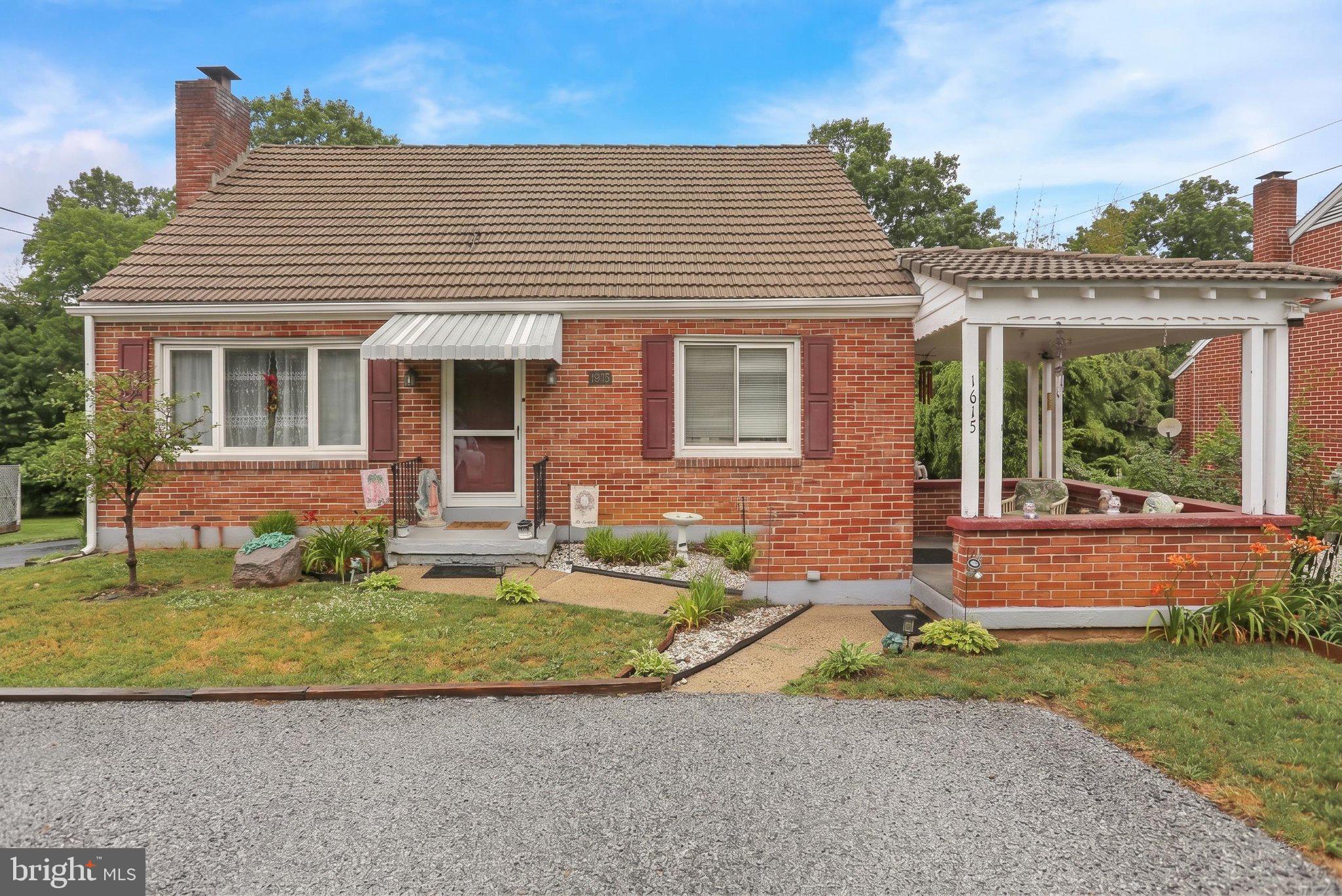 Welcome to this charming Cape Cod nestled in the heart of Muhlenberg Township! This well-maintained home offers 3 bedrooms, 2 bathrooms, and a versatile layout designed for comfortable everyday living.

Step inside to find beautiful hardwood floors, a spacious eat-in kitchen, and a cozy living room centered around a fireplace. A convenient first-floor bedroom and full bath provide flexibility for guests, a home office, or one-floor living.

The finished walkout basement offers additional living space complete with a wet bar, making it the perfect spot for entertaining, relaxing, or creating a game or media room. Outside, enjoy a large covered rear deck overlooking the fenced backyard—ideal for summer gatherings, pets, or simply unwinding outdoors.

A private driveway with ample off-street parking adds everyday convenience. Combining classic Cape Cod charm with functional living spaces, this home is ready for its next owner. Schedule your private showing today!